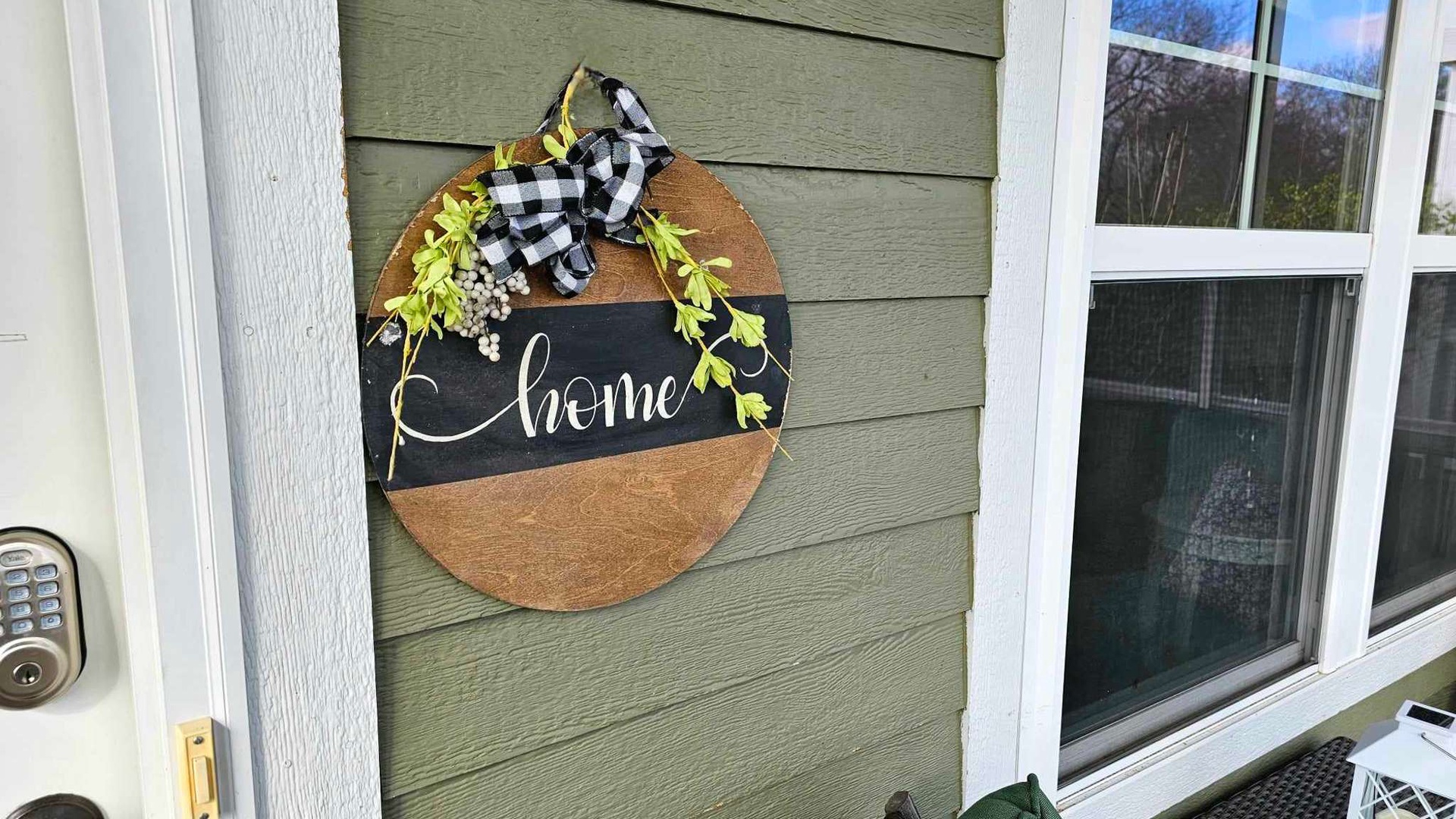 A welcoming entrance with charming seasonal decor greets you at this cozy property.