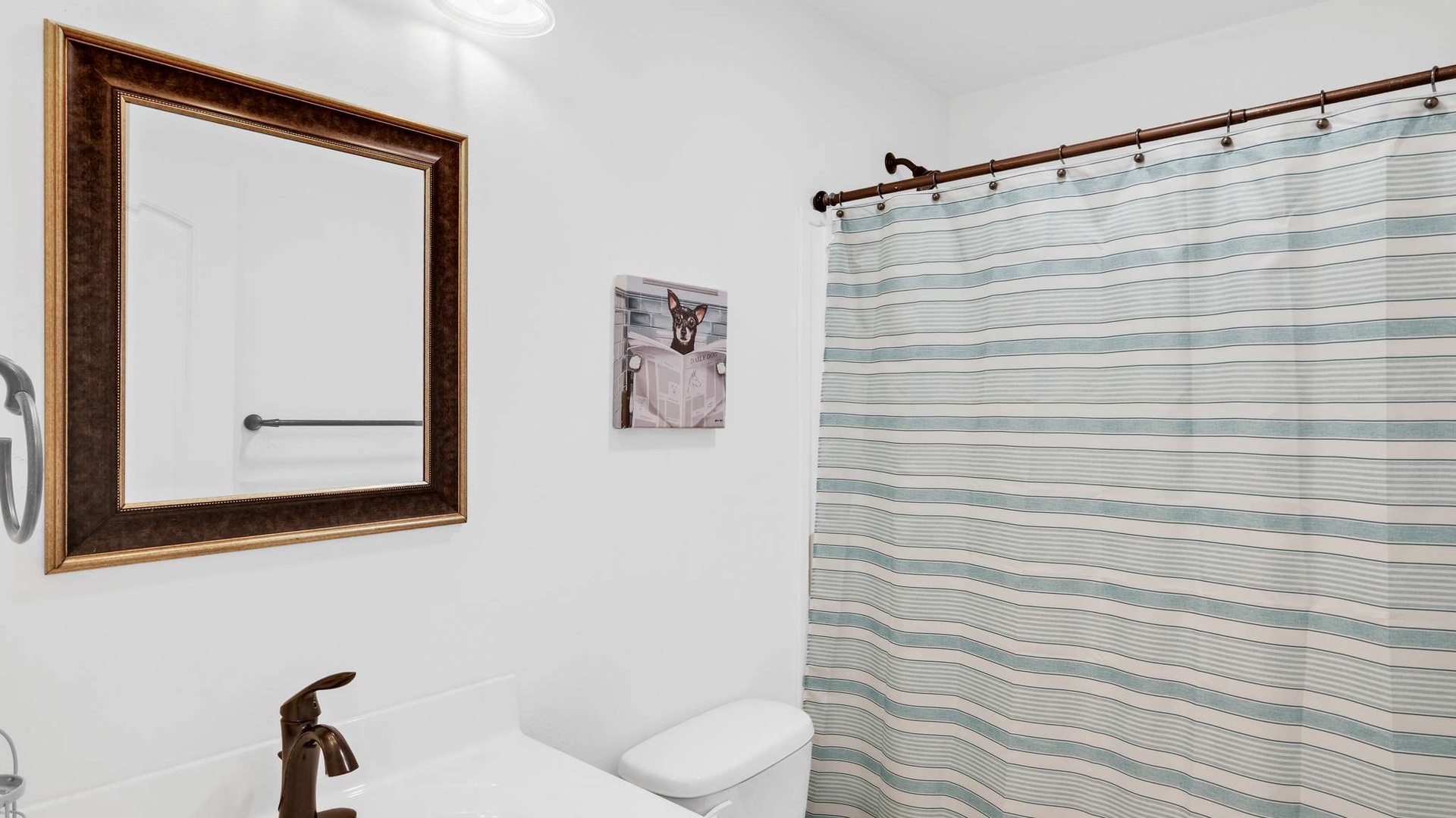 Step into your private bathroom featuring a relaxing tub with shower combo, perfect for unwinding after exploring.