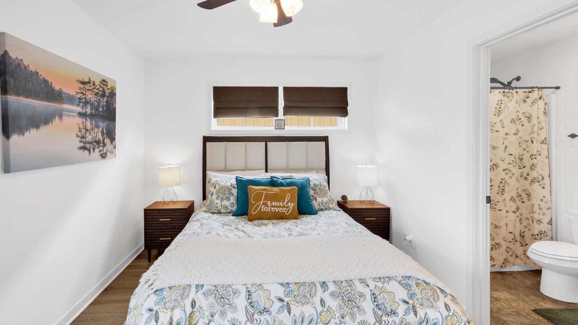 Relax in your peaceful bedroom with nature artwork, while your private en-suite bathroom awaits steps away.