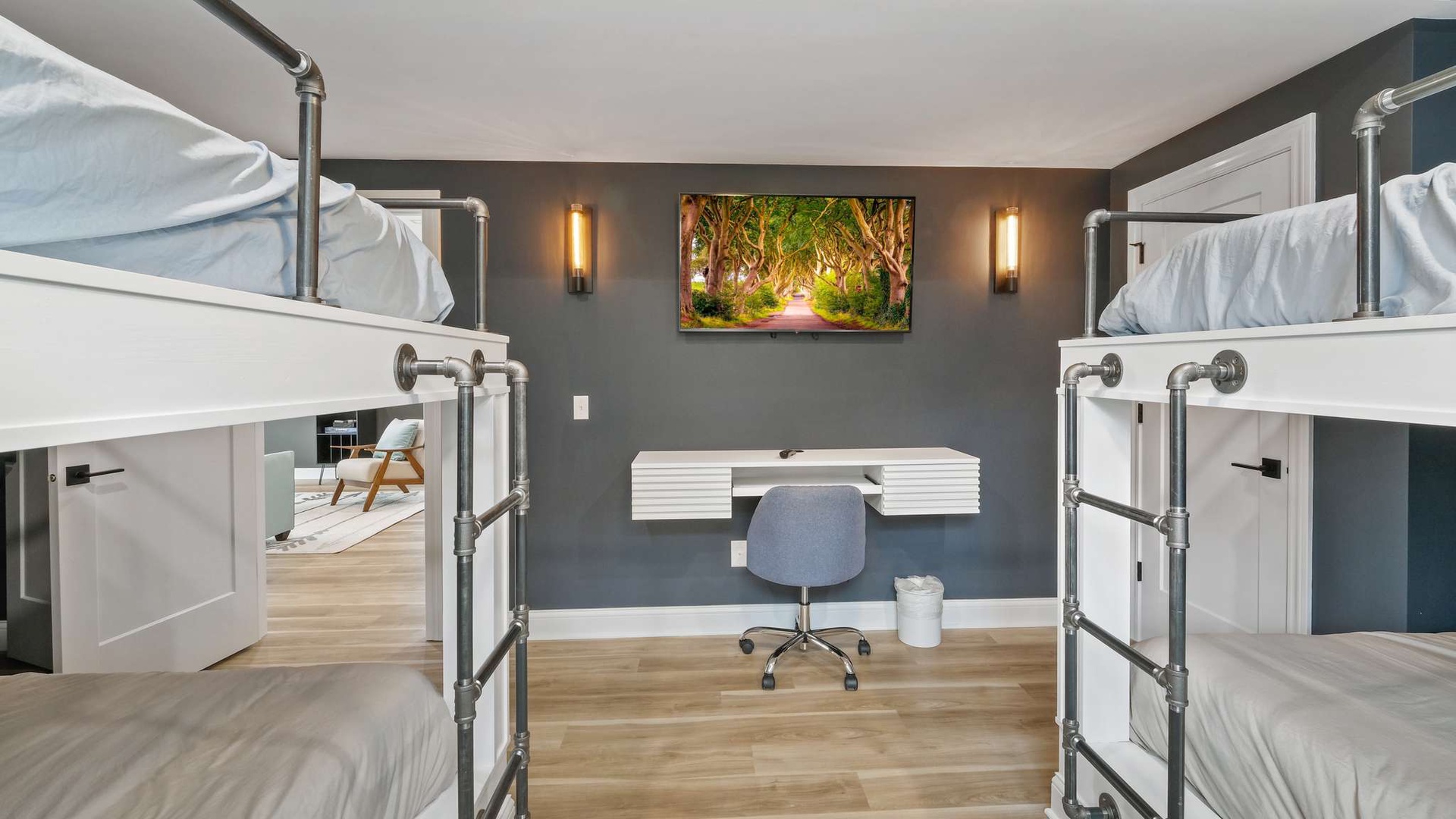 Your bunk bed room offers space-efficient comfort with a dedicated work desk for productivity.