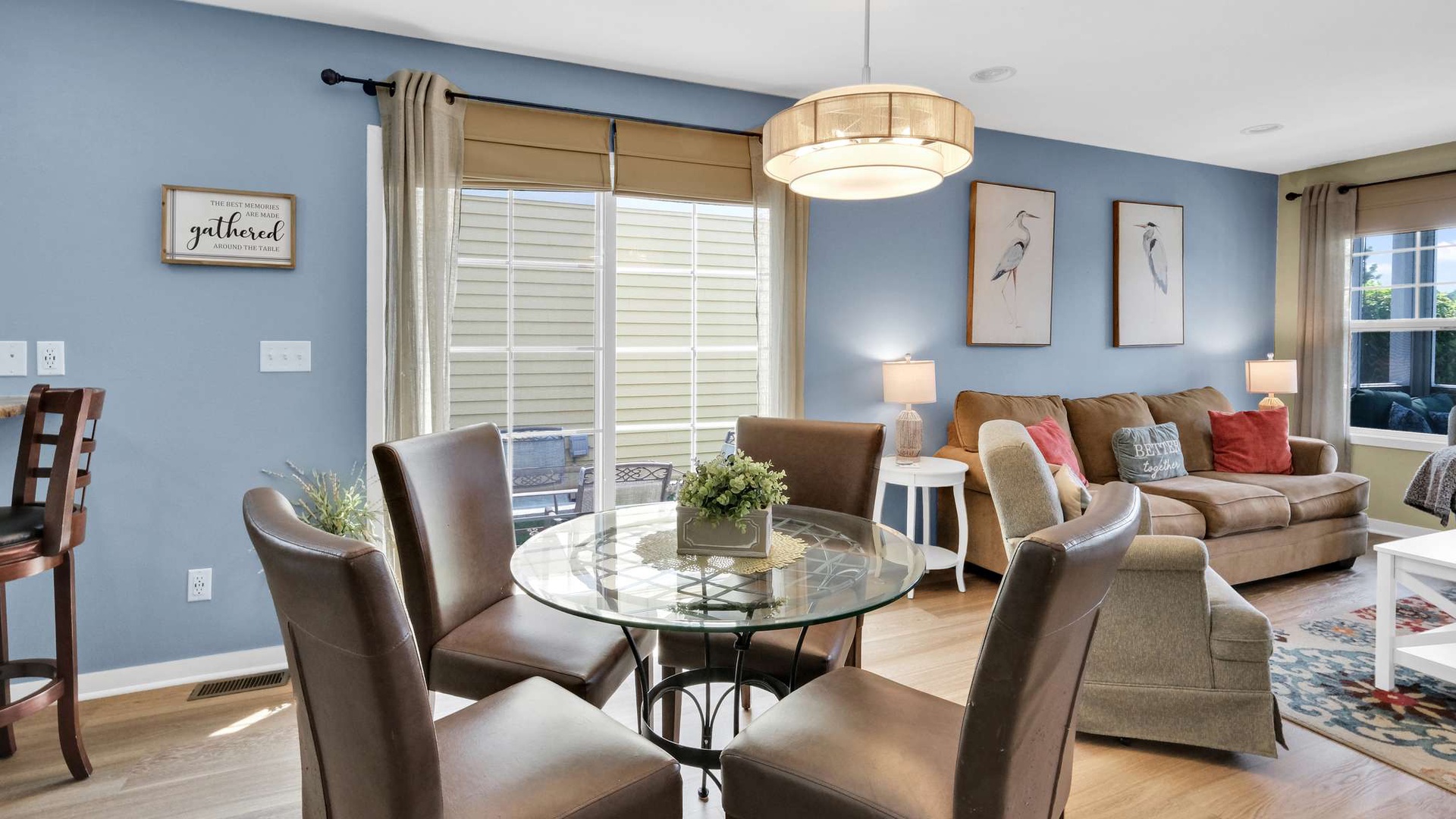 Unwind in your stylish living space with plush seating, natural light streaming through plantation shutters, and thoughtful decor creating the perfect home away from home.