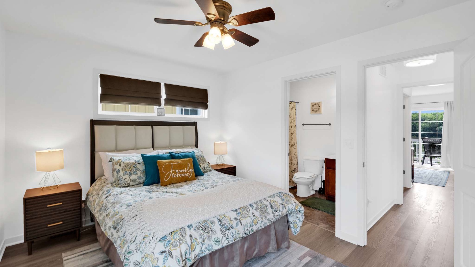 Rest easy in your peaceful bedroom, where soft linens and gentle ceiling fan breezes create the perfect retreat for sweet dreams.