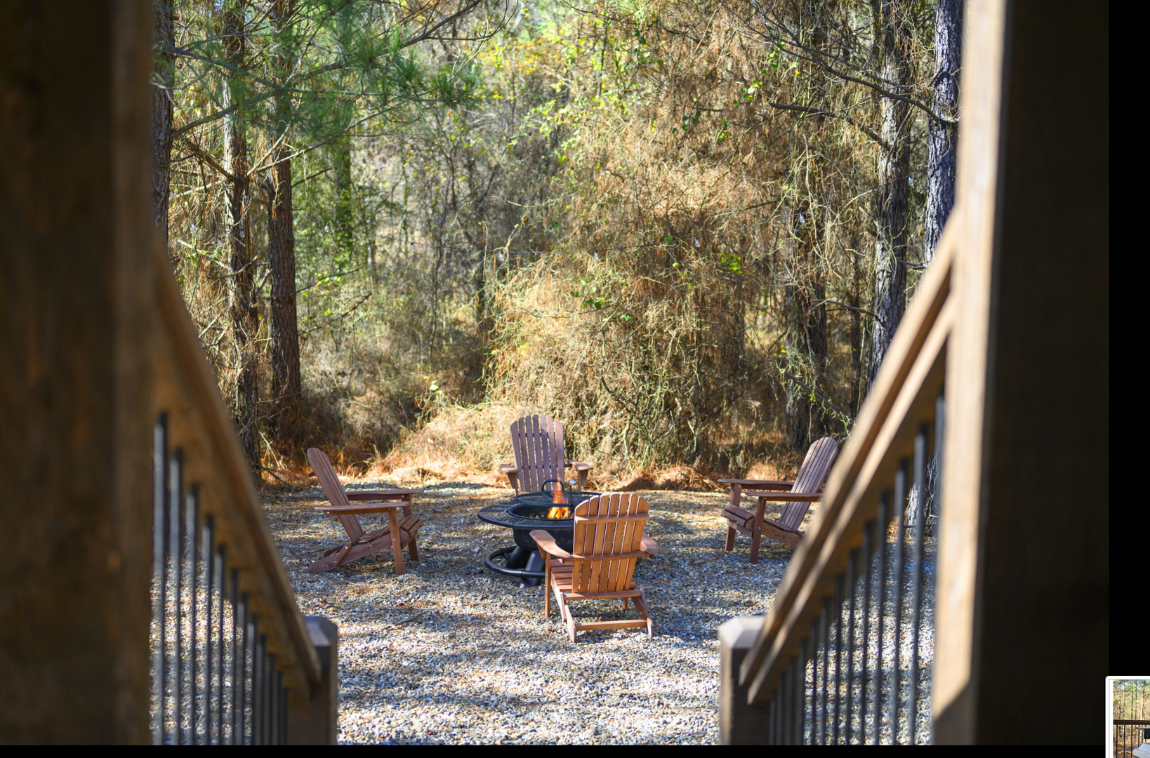 Step outside to your private fire pit surrounded by cozy Adirondack chairs, nestled in peaceful woods for evening stories.
