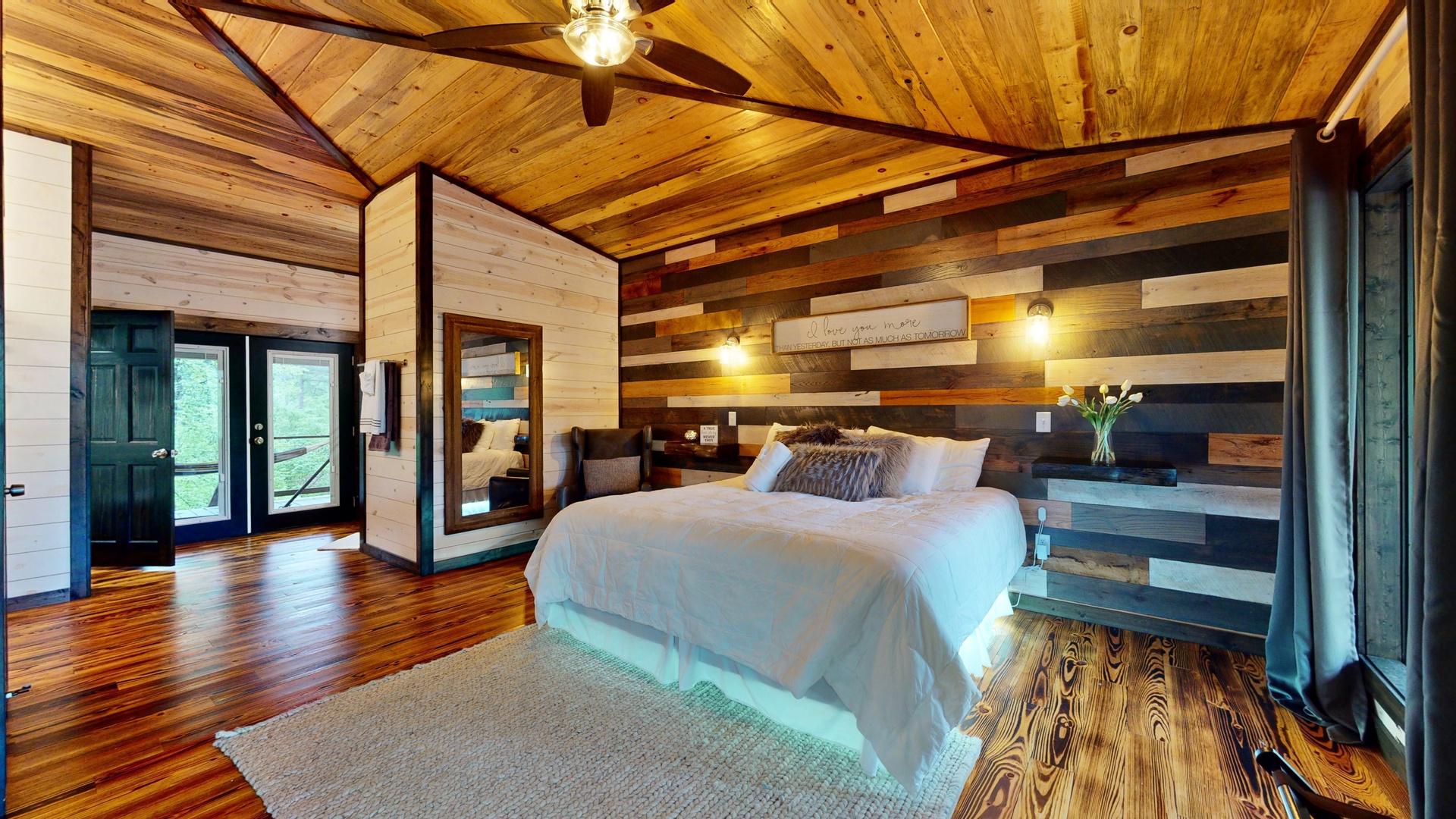 Drift off in your private retreat, wrapped in rustic charm. Warm wood tones and natural light create the perfect escape for your mountain getaway.