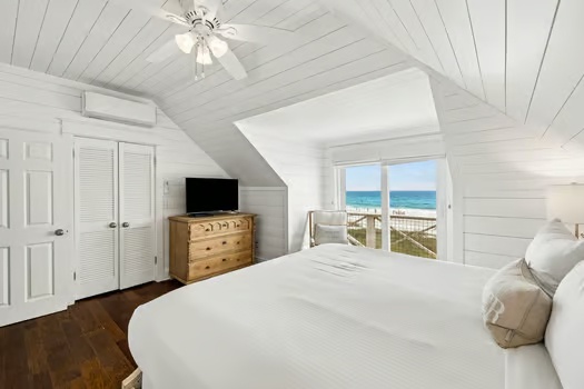 Wake to ocean views and gentle waves from your serene loft bedroom, where coastal breezes and morning light create a peaceful retreat above the shore.