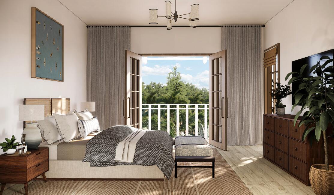 Your tranquil bedroom sanctuary features French doors opening to a private balcony with garden views.
