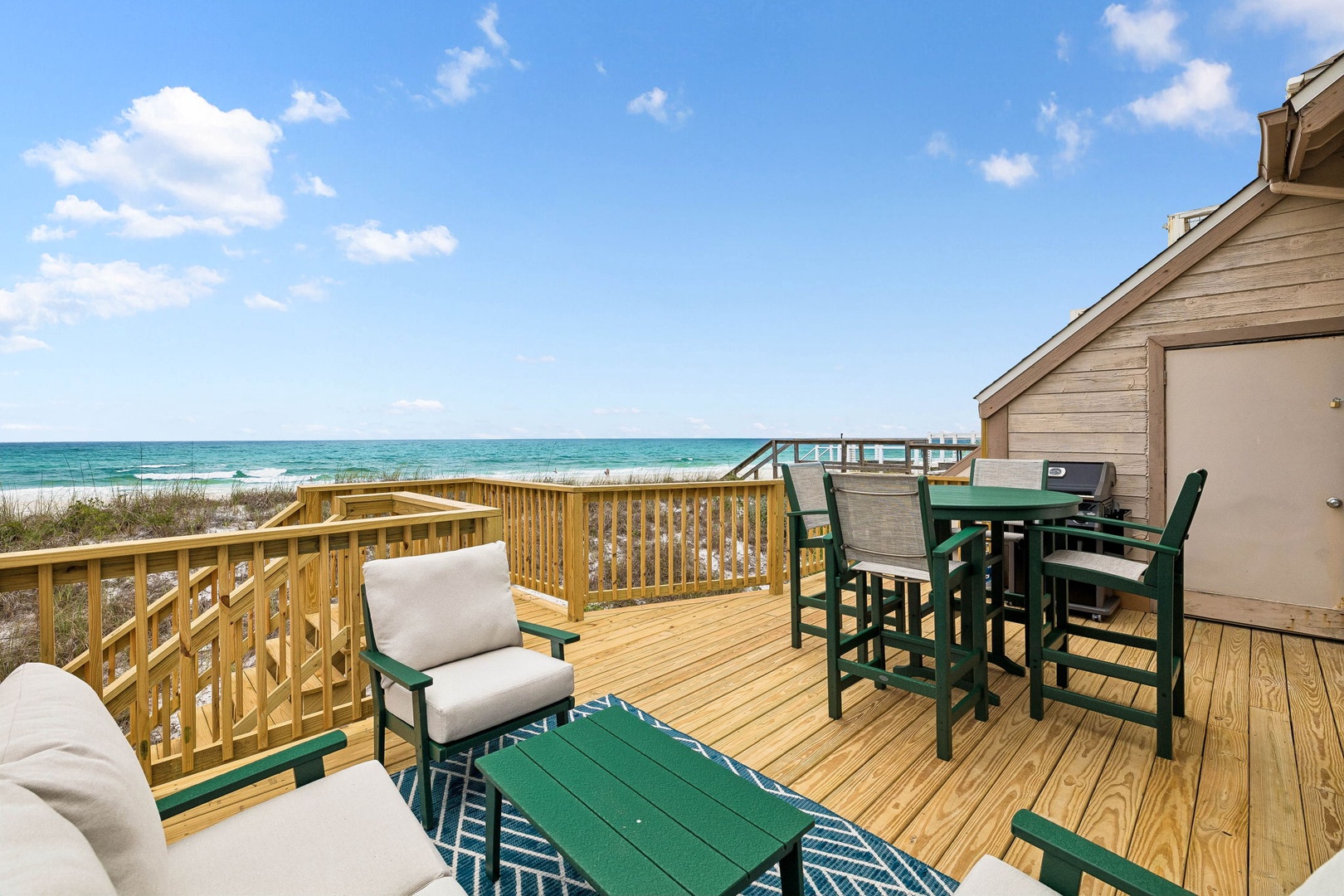 Picture yourself unwinding on this spacious deck with turquoise waters and soft sand just steps away. Sip your morning coffee as gentle waves roll in, or gather for sunset cocktails with loved ones in your private beachside retreat.
