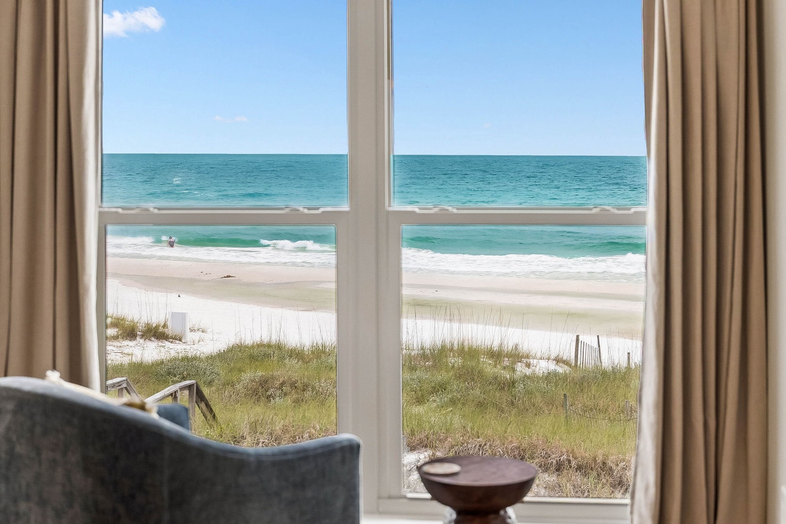 Wake up to pristine white sand and turquoise waves right outside your window—your own private slice of coastal paradise.