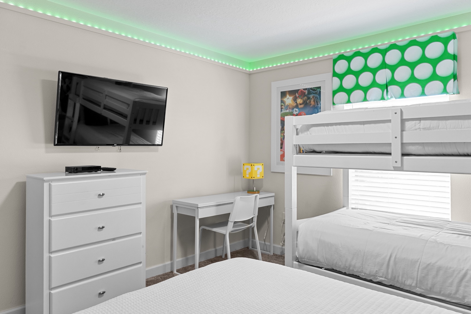 Your family will love this bright bedroom with bunk beds, perfect for kids to create memories together while enjoying modern comforts.
