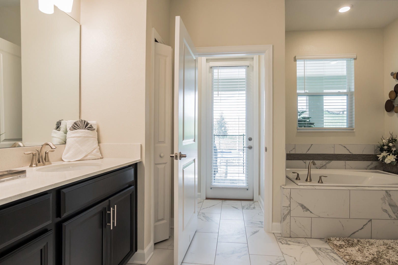 bathroom with garden tub first floor