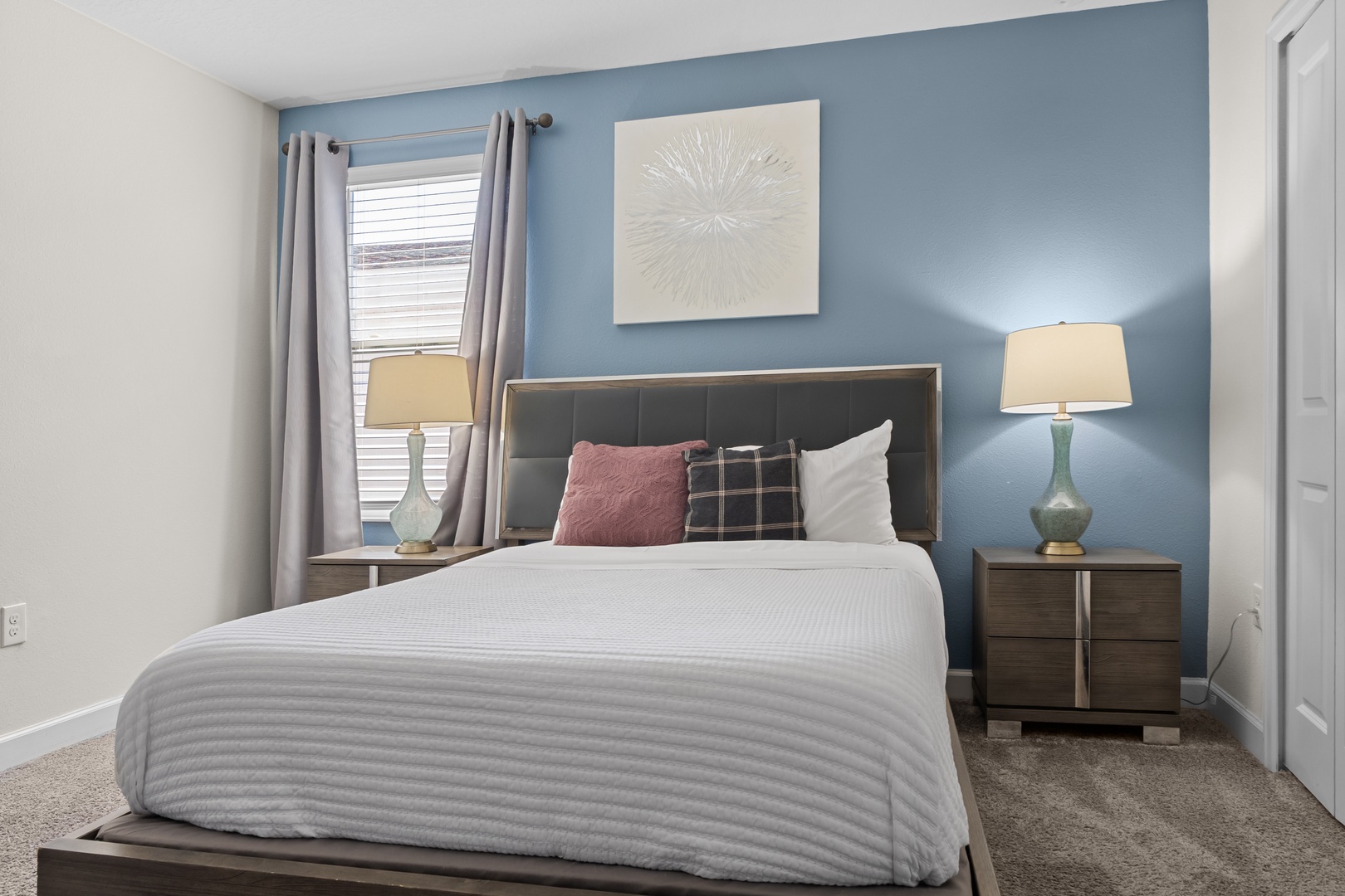 Slip into crisp linens and rest against the stylish headboard while soft bedside lighting creates the perfect ambiance for your evening unwind.