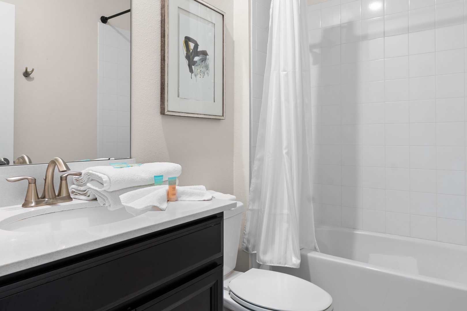 Refresh in your pristine bathroom with fluffy towels, quality amenities, and a spacious tub-shower combo for relaxing soaks.