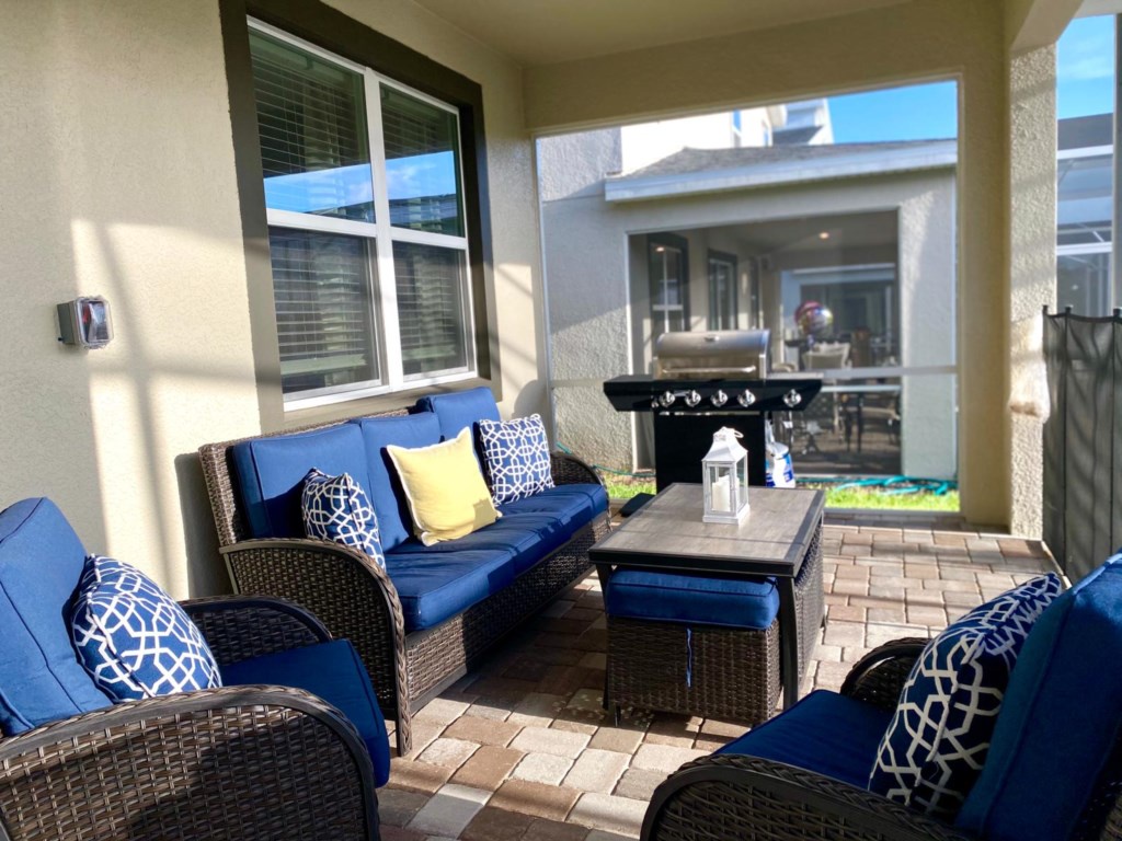 outdoor sitting area with grill