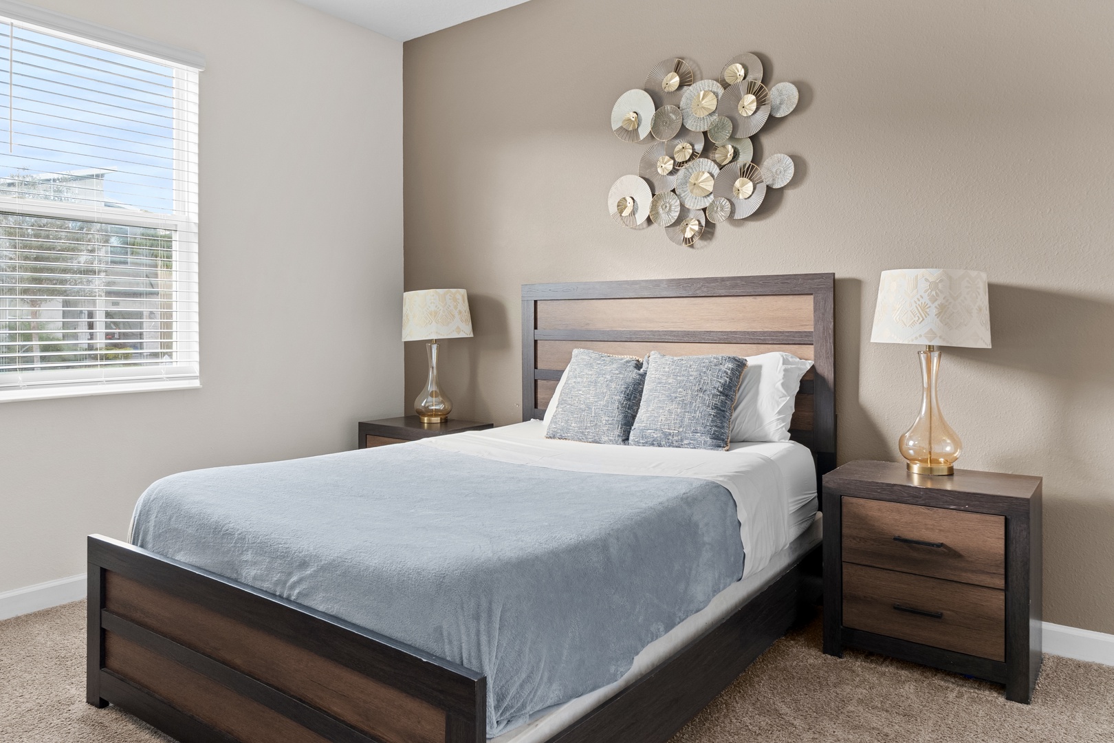 Sink into your cozy bedroom retreat with plush blue bedding and modern touches that make every morning feel refreshed.