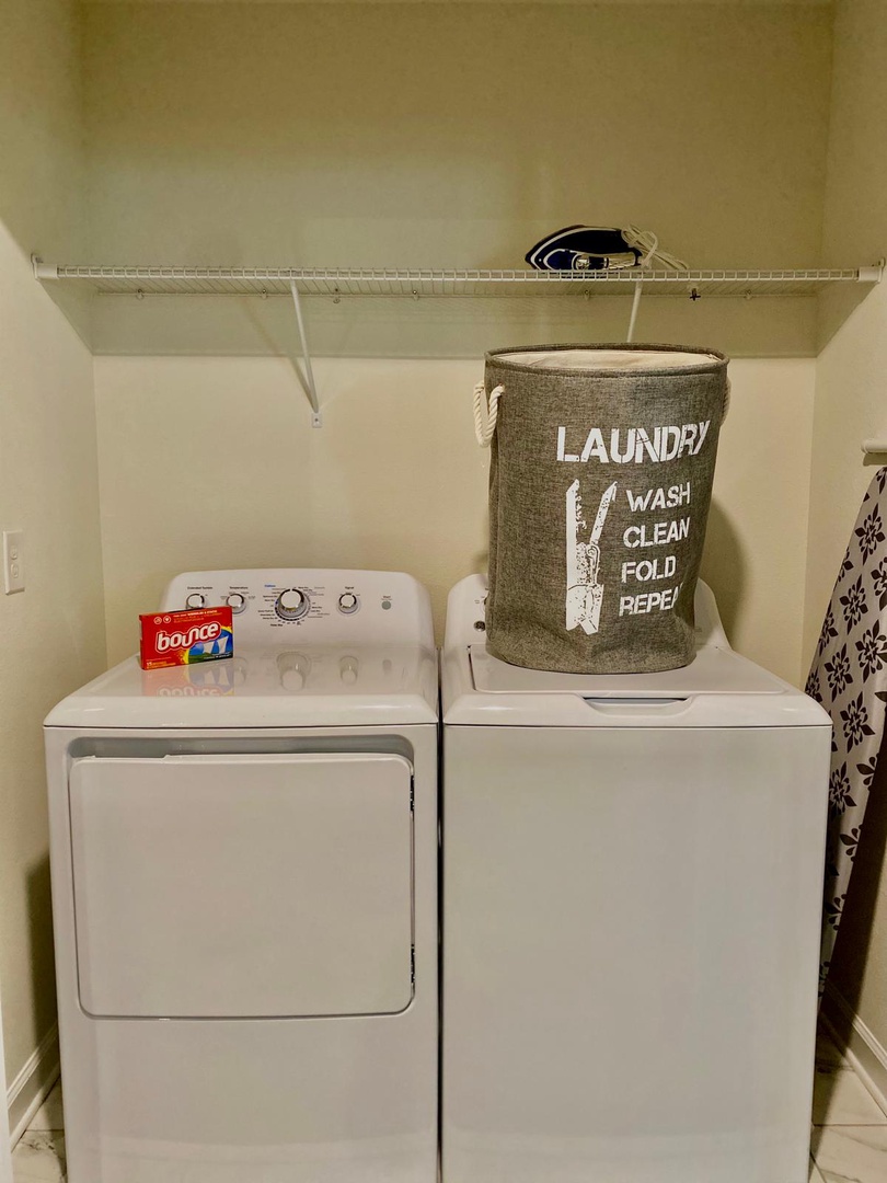 indoor laundry with washer and dryer