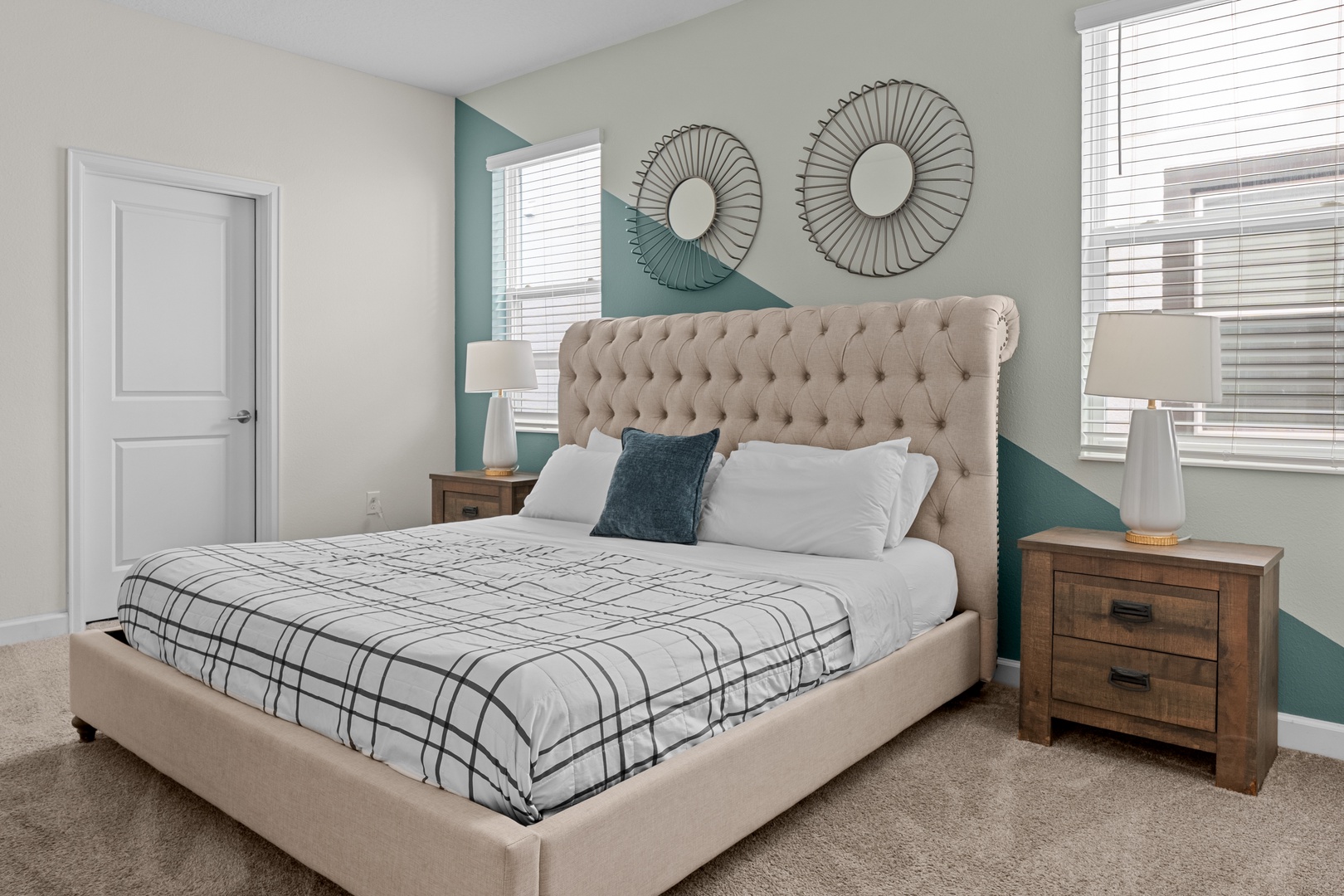 Sink into your plush tufted bed surrounded by soothing colors and natural light streaming through your private windows.