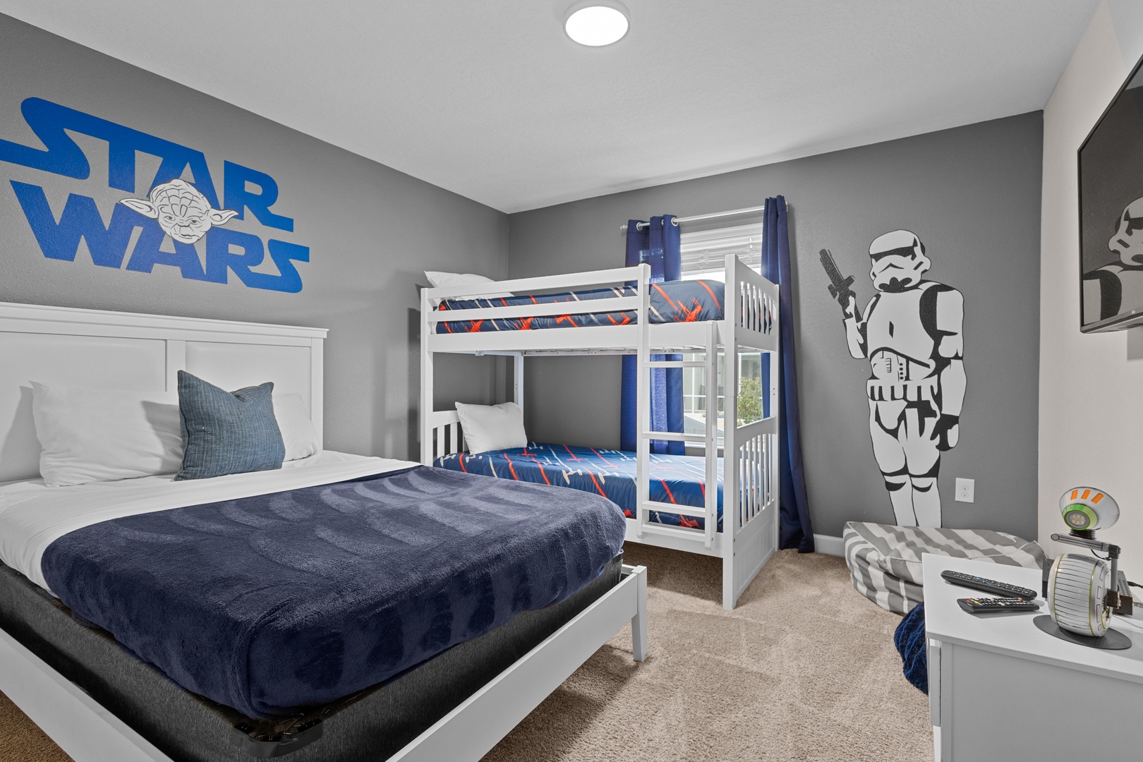 Your kids will love this Star Wars themed bedroom with bunk beds and space for adventure dreams to come alive.