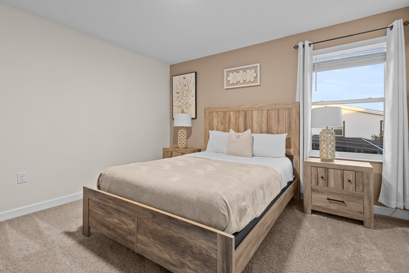 Unwind in your stylish bedroom with cozy rustic wood furnishings and crisp linens that promise a perfect night's rest.