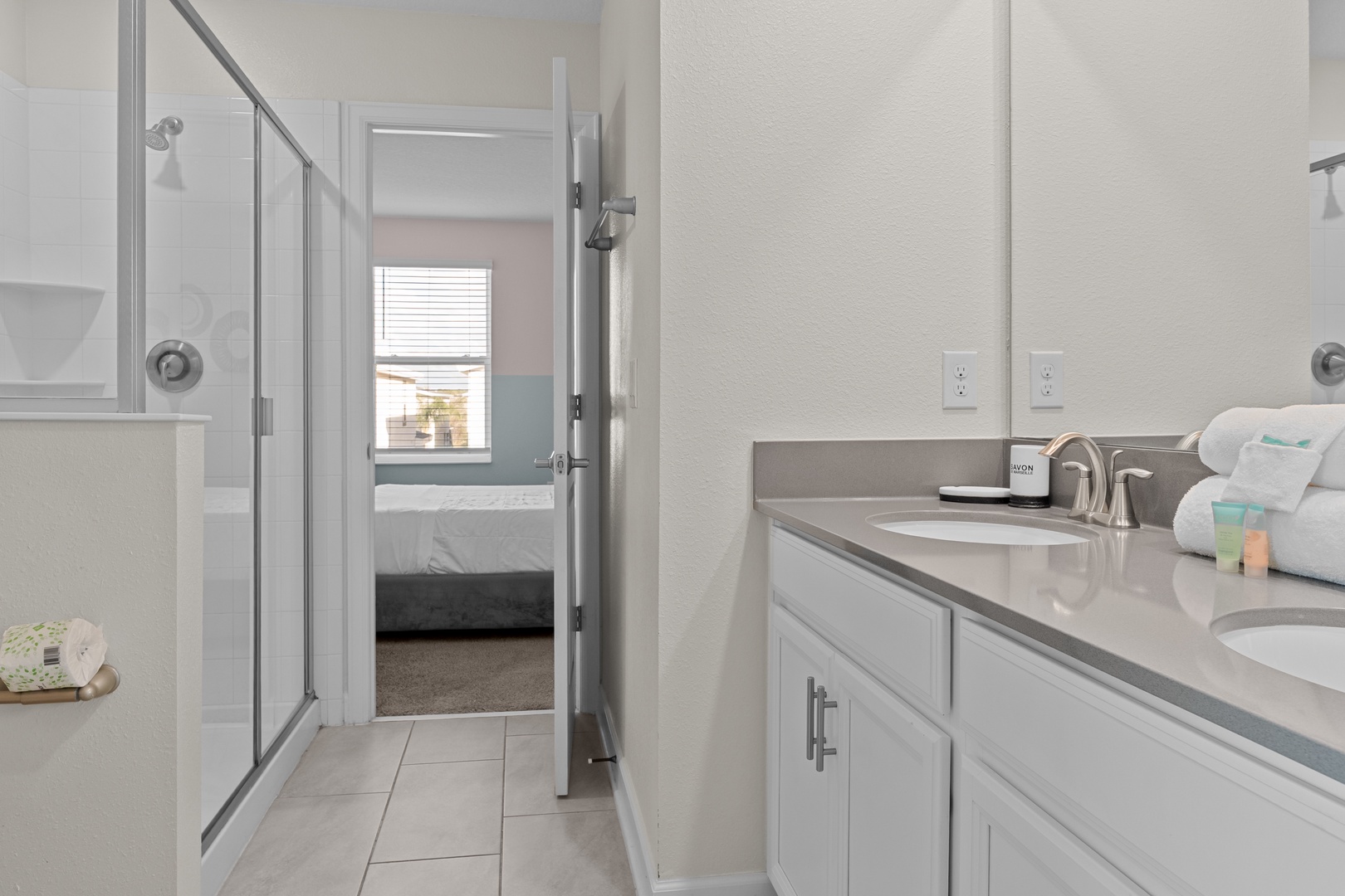 Your private bathroom features modern finishes, spacious shower, and dual vanities for your comfort and convenience.