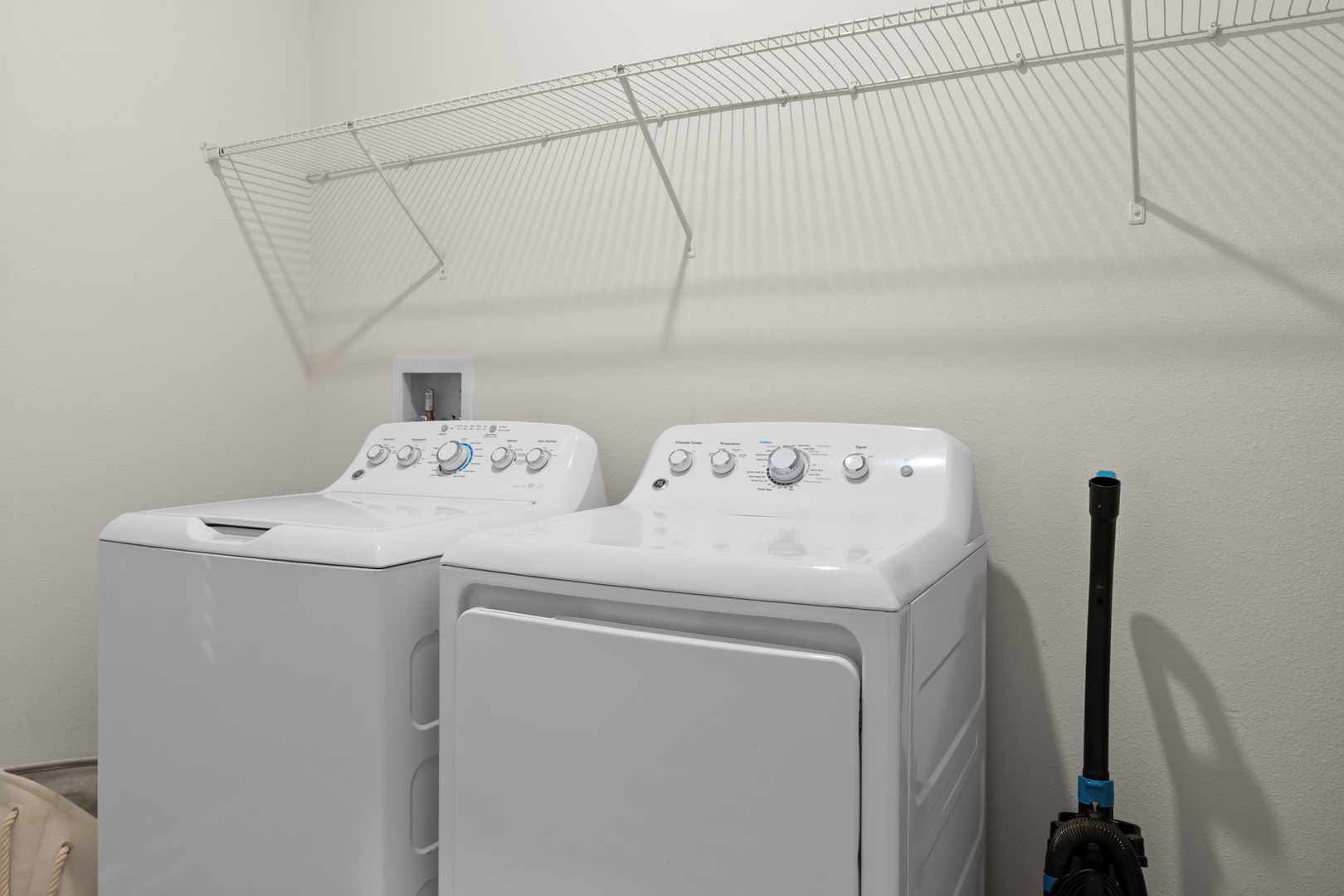 Your private laundry room keeps your clothes fresh throughout your stay, with convenient shelving for organizing linens.