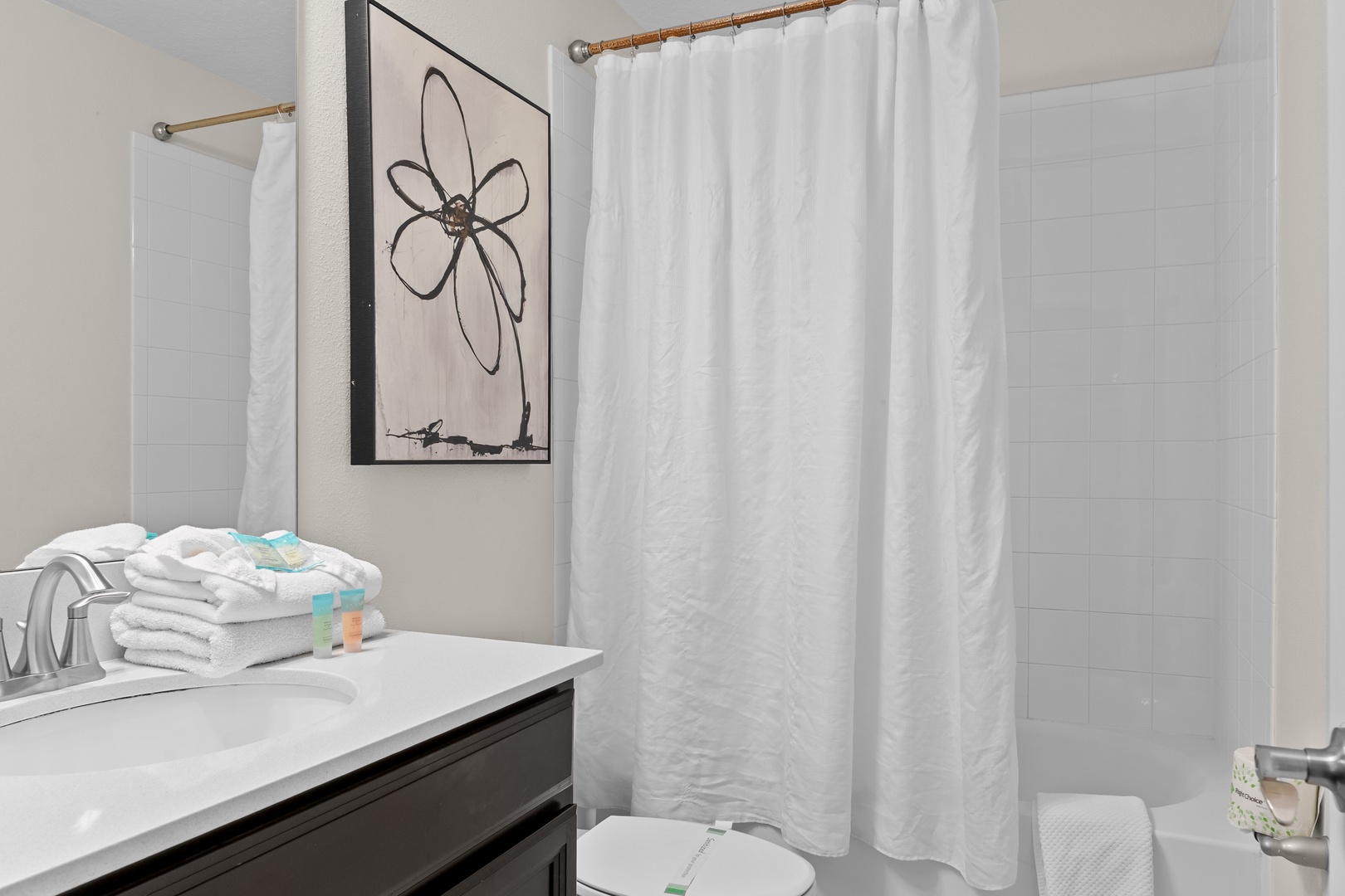 Refresh in your bright, clean bathroom with modern vanity and walk-in shower.