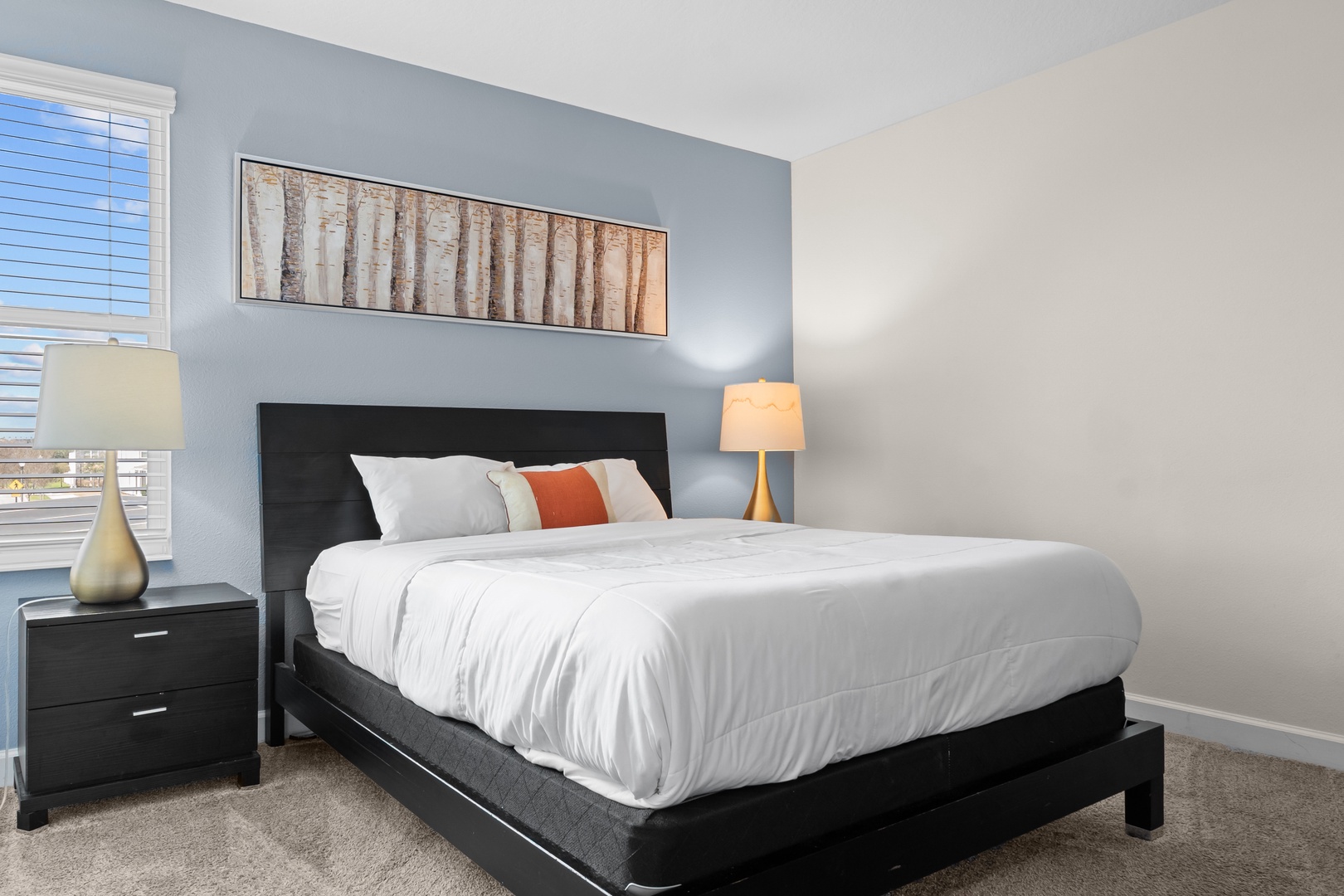 Sink into plush bedding and unwind in your serene bedroom, where soft lighting and thoughtful decor create the perfect retreat.