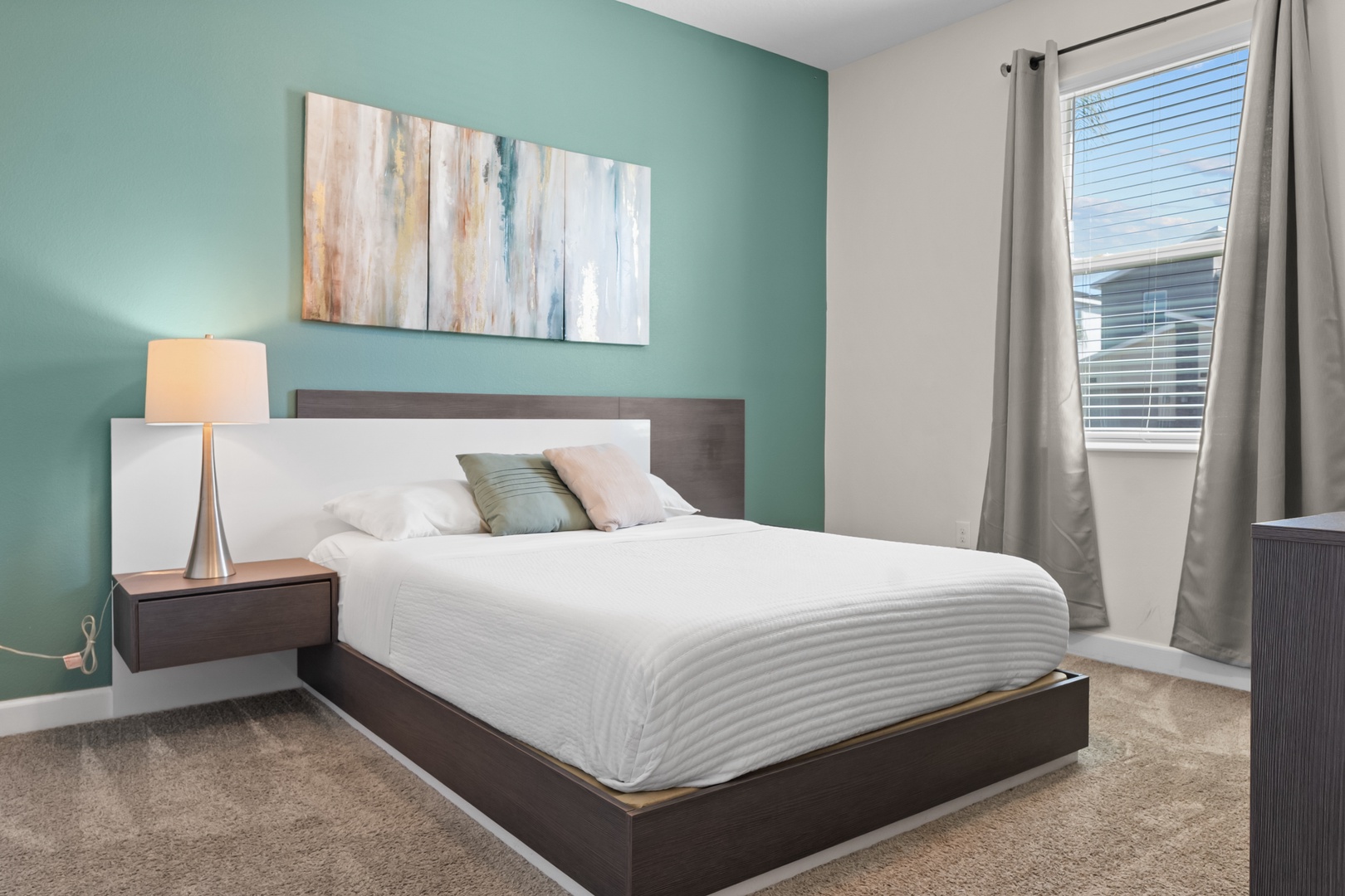 Drift into peaceful sleep in your serene bedroom, where calming colors and modern comfort create the perfect retreat after your adventures.