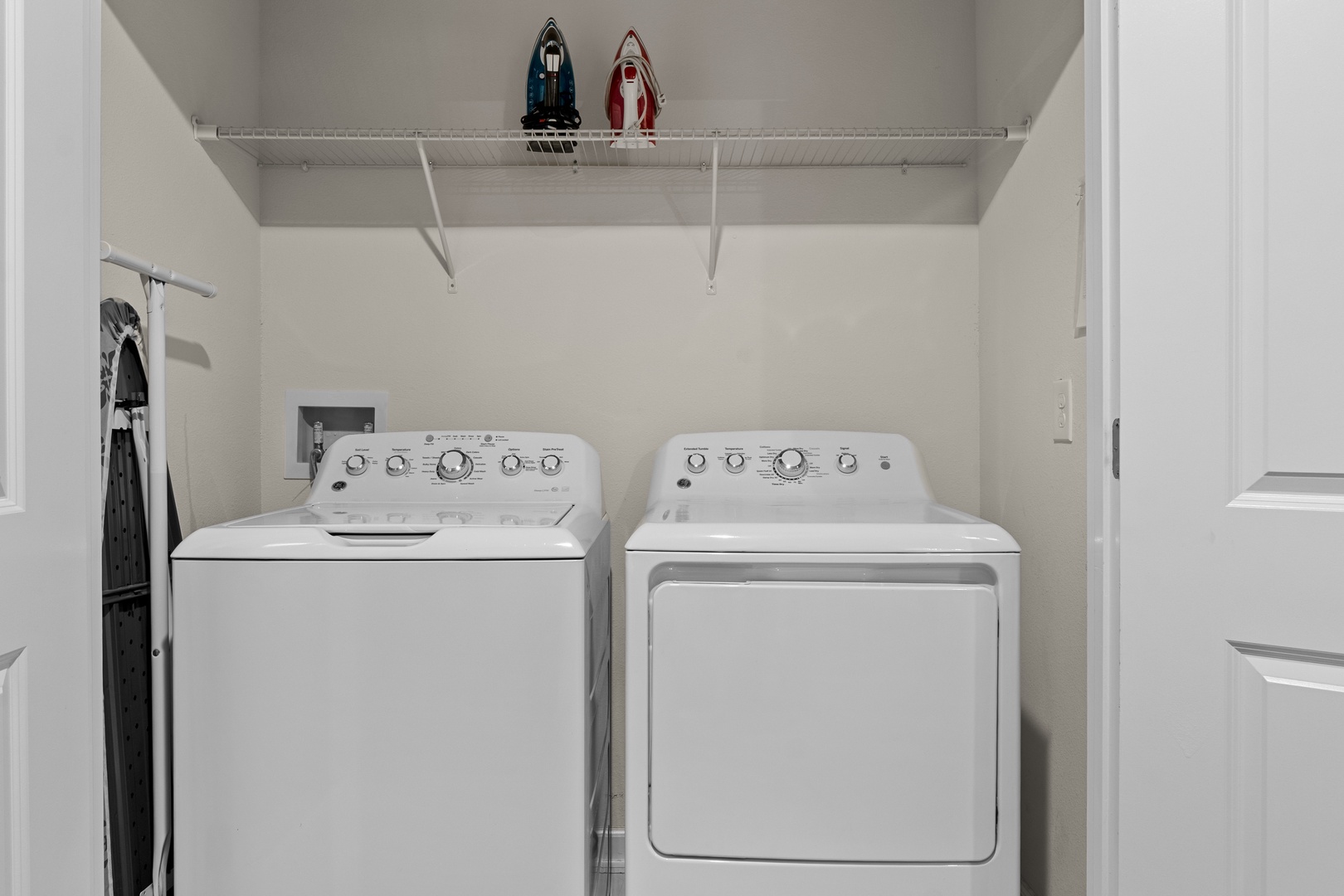Your dedicated laundry room features full-size washer and dryer with organized storage space and convenient shelving for all your needs.