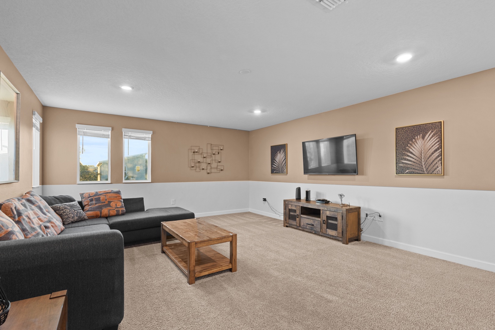 Sink into your private living room's plush sectional sofa and enjoy movie nights on the large flat-screen TV in this spacious, beautifully appointed space.