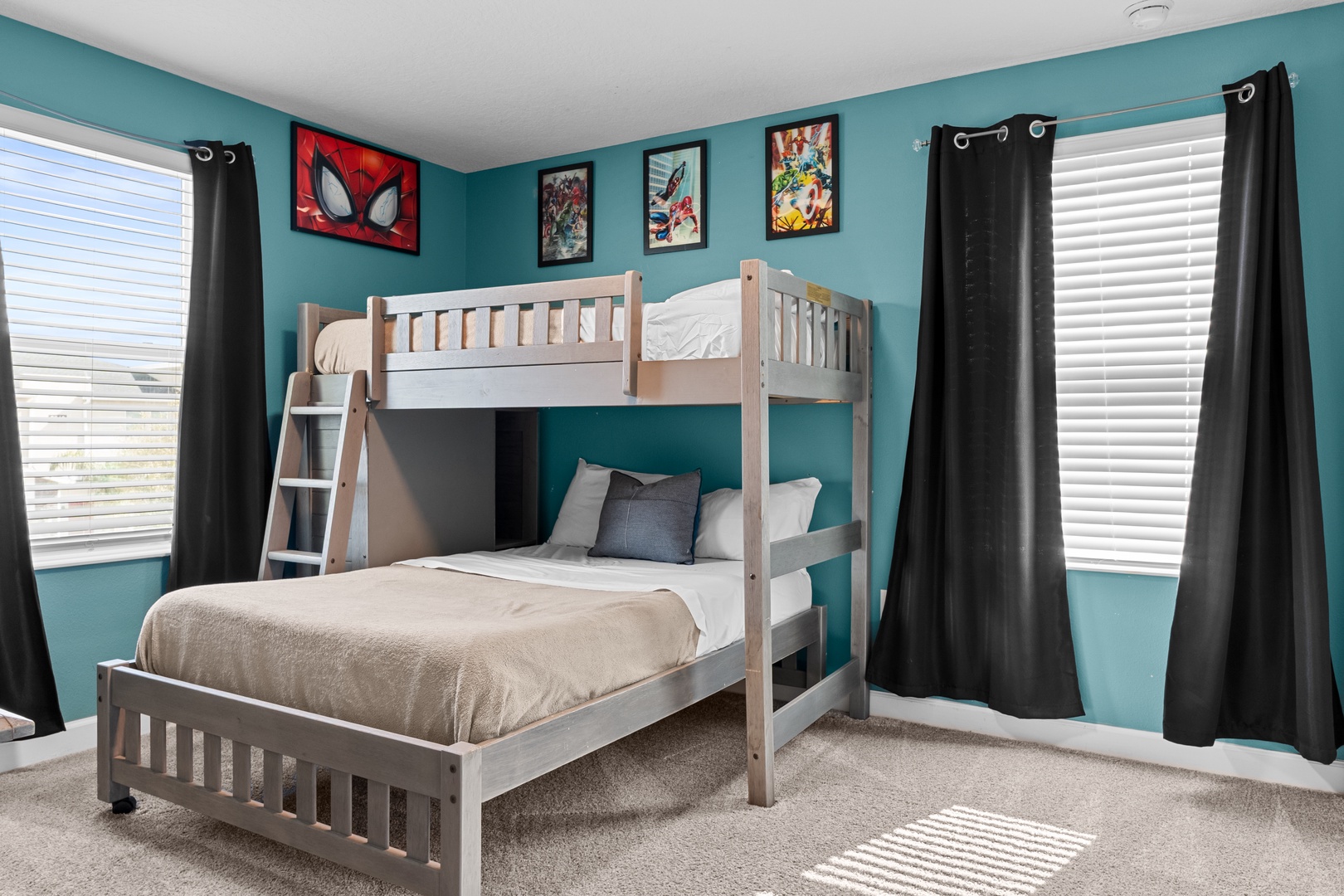 Your little superheroes will love this vibrant bedroom with comic-themed art and cozy bunk beds for bedtime adventures.
