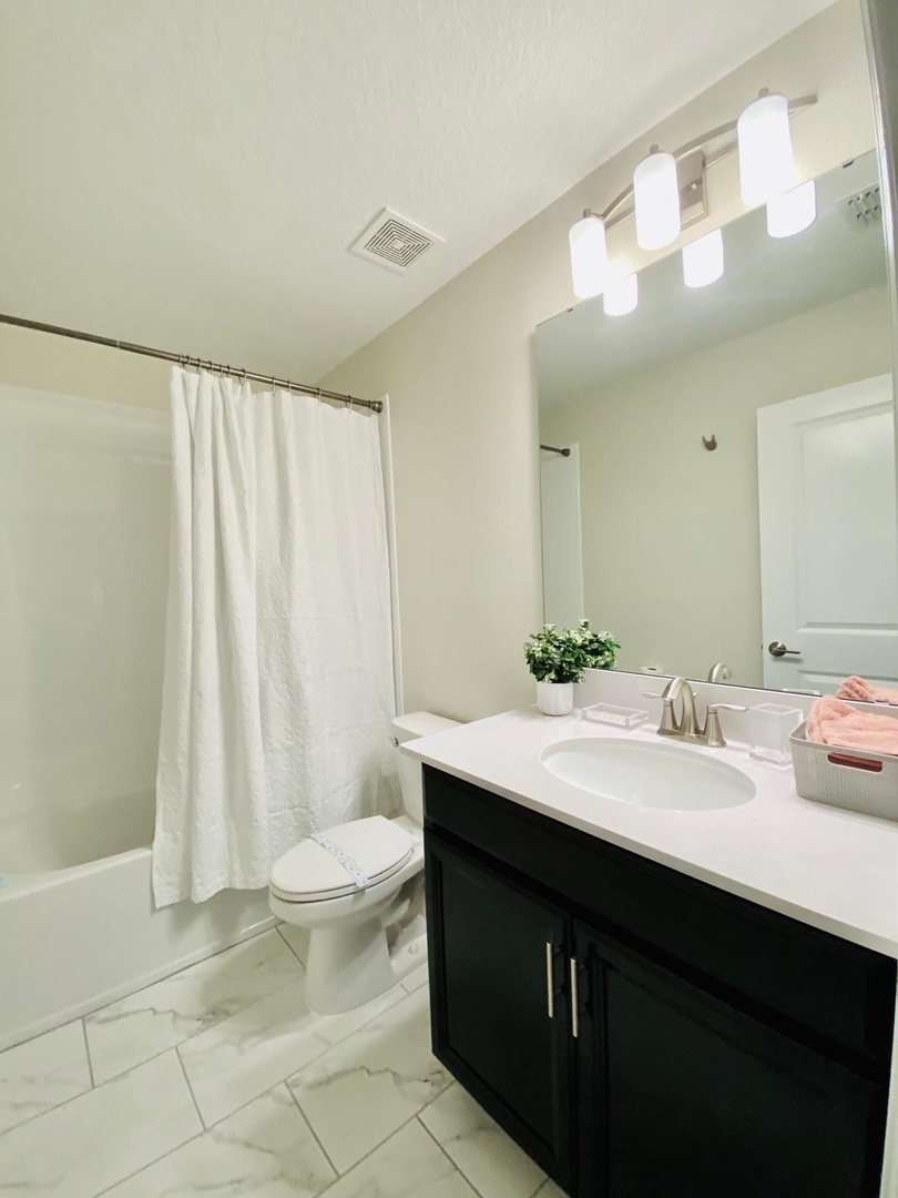 bathroom #4  with tub shower combo