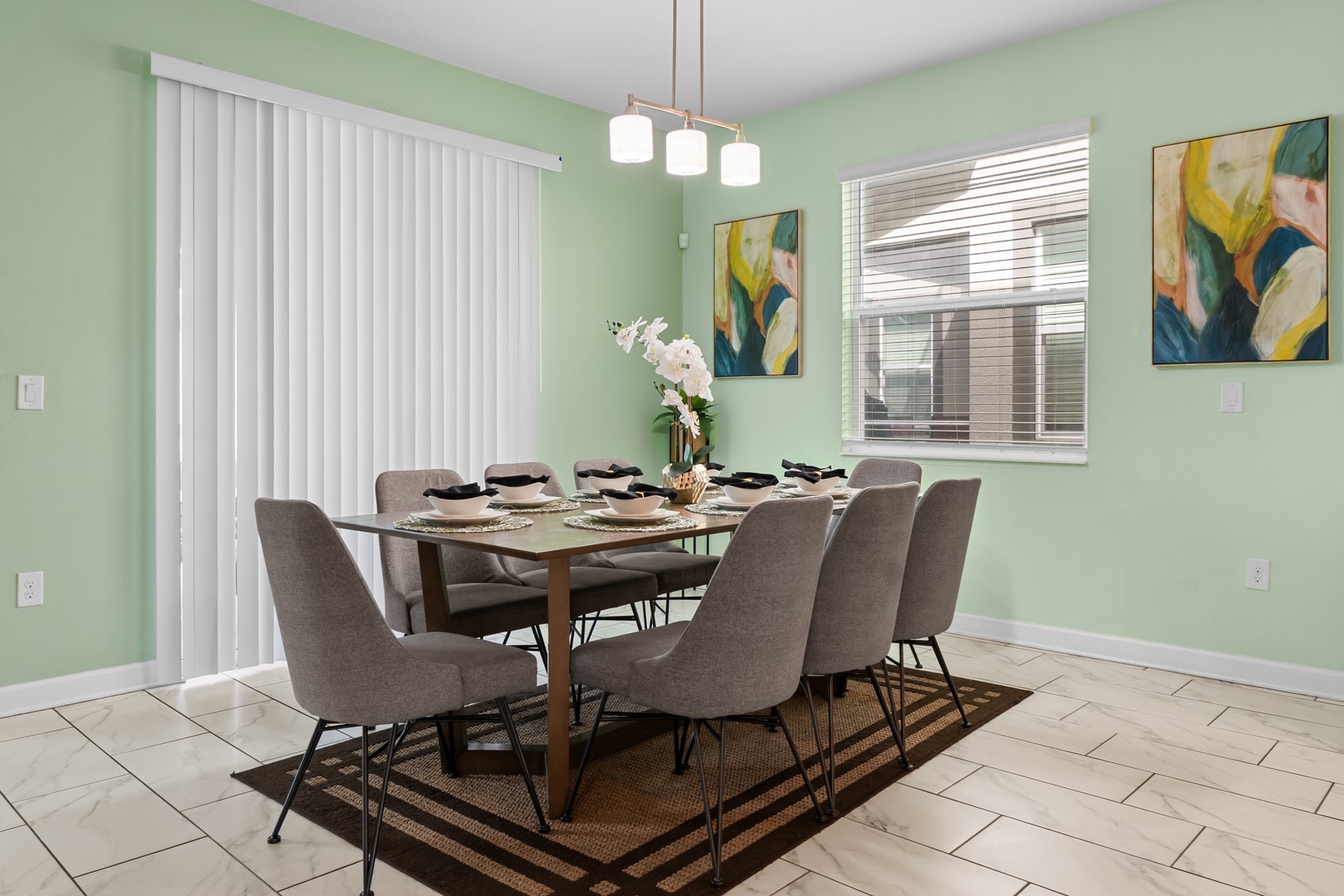 Gather around this beautifully appointed dining table where you'll share memorable meals with loved ones in serene comfort.