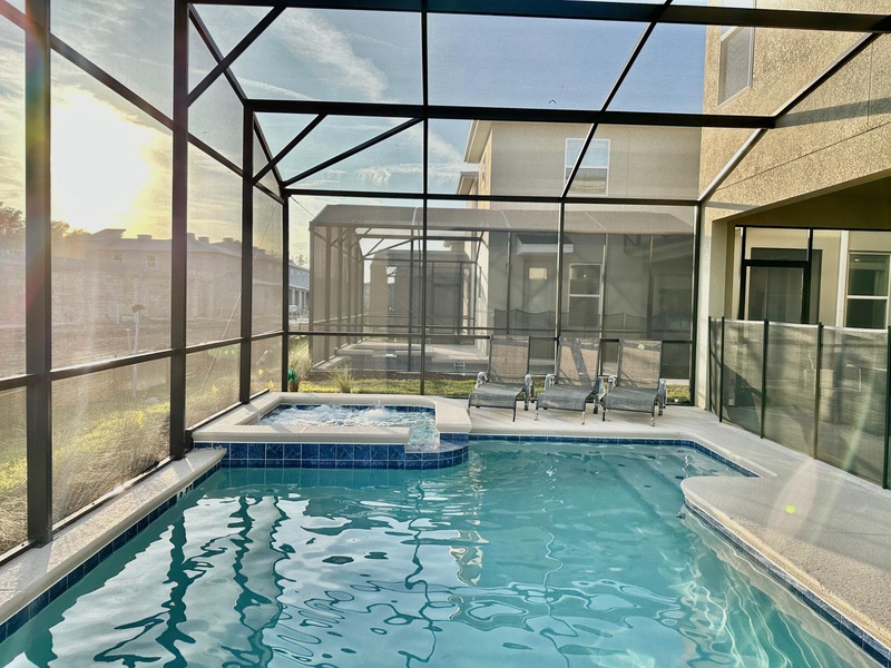 Your private enclosed pool and spa await, where crystal-clear water shimmers beneath the glass ceiling, creating a perfect year-round oasis.