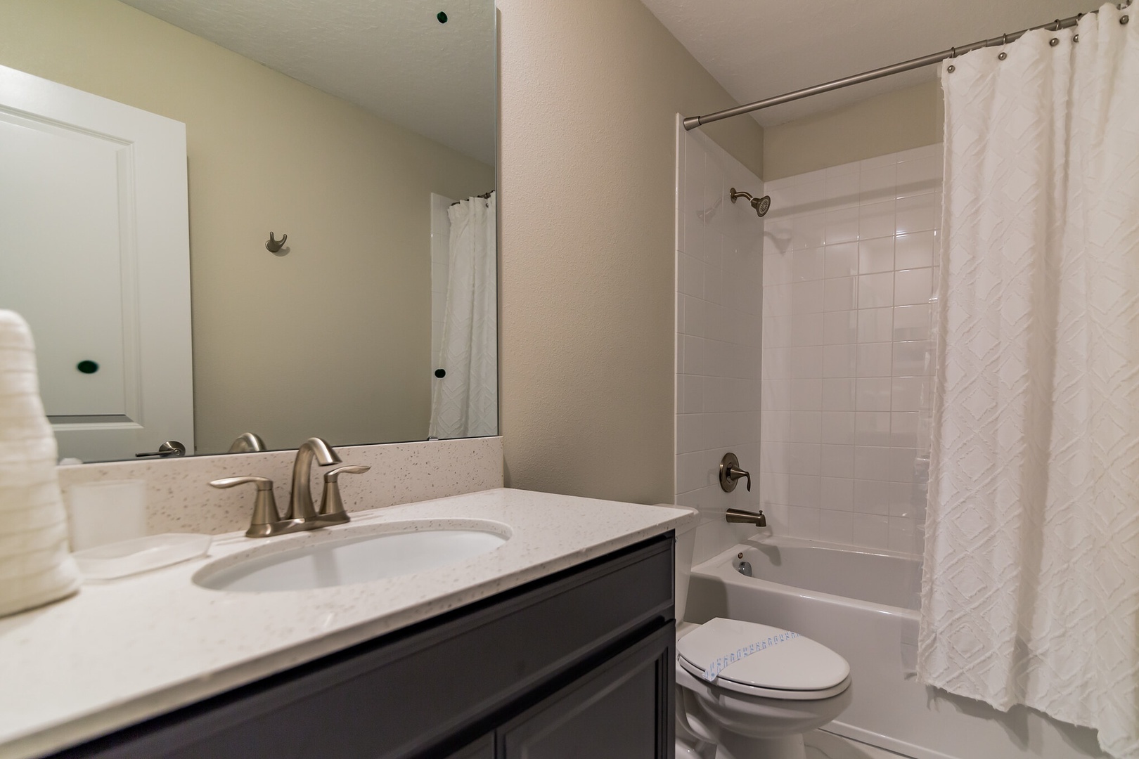 bathroom with shower tub combo