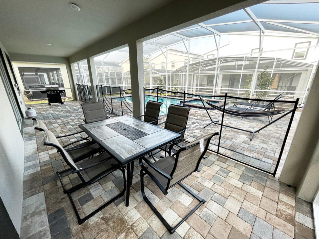 Patio dining table, pool and Grill