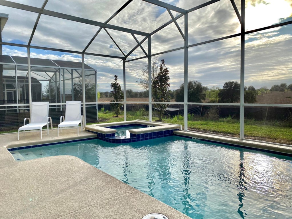 Private pool area, launge chairs and patio furniture