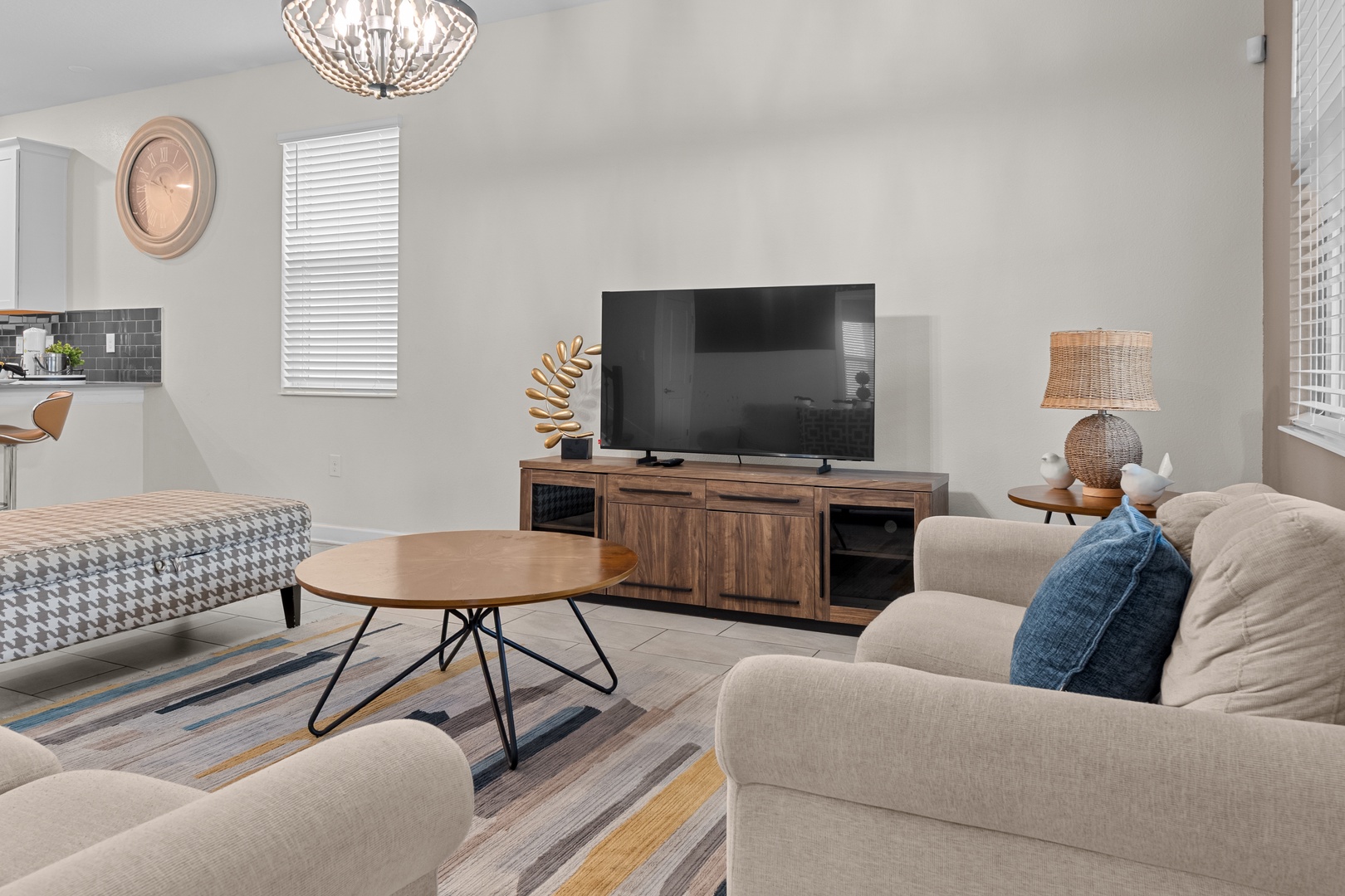 Unwind in your beautifully appointed living space, where modern comfort meets warm style with plush seating and thoughtful touches.