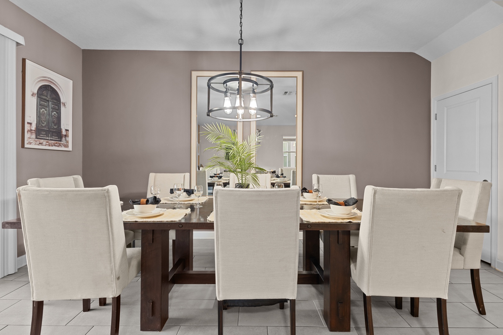 Gather around this elegant dining table for memorable meals with your travel companions in this thoughtfully designed space.