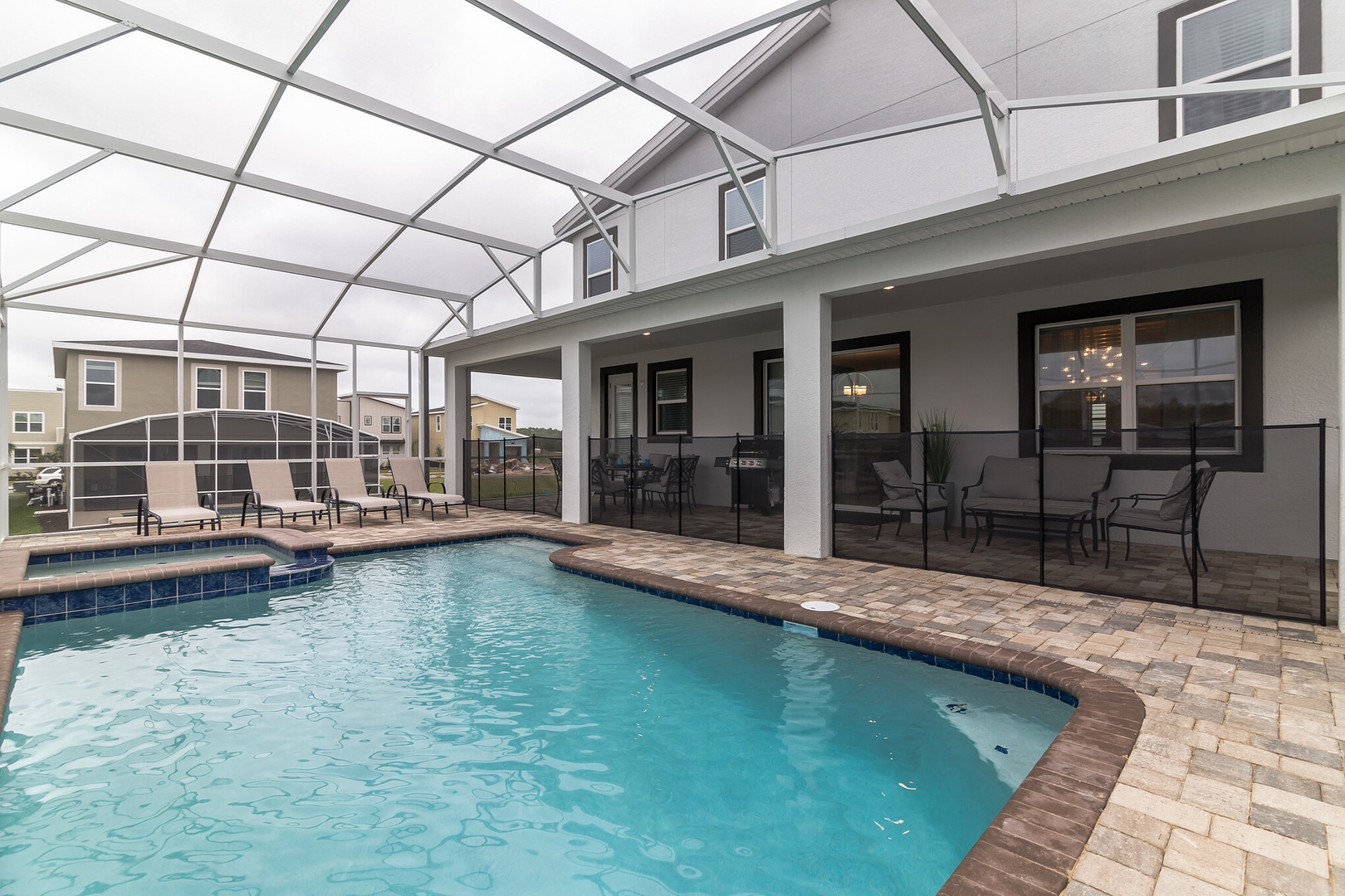 Private pool area, launge chairs and patio furniture