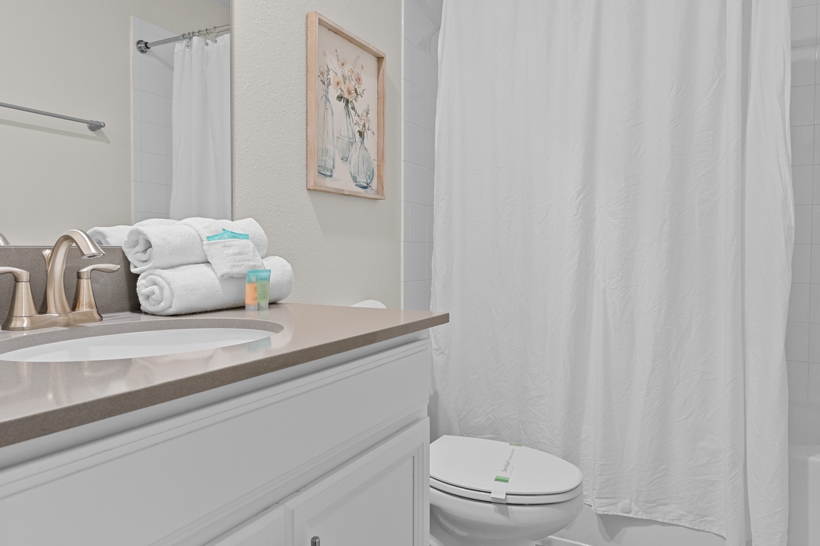 Your private bathroom features fresh towels, quality amenities, and a relaxing shower to refresh after your adventures.