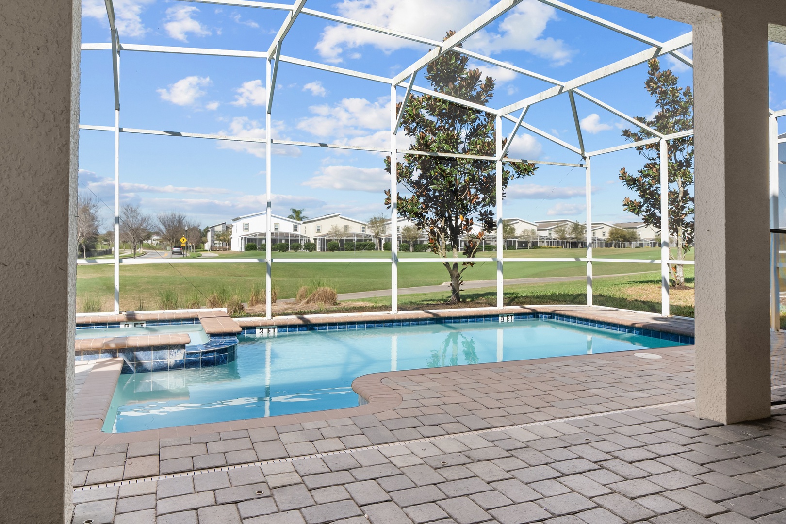 Take a refreshing dip in your private screened pool, surrounded by peaceful views and warm Florida sunshine.
