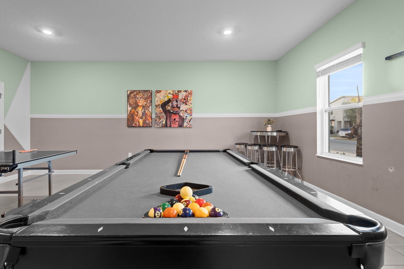 Challenge friends to a game of pool in your private entertainment space, complete with ping pong and refreshing drinks.