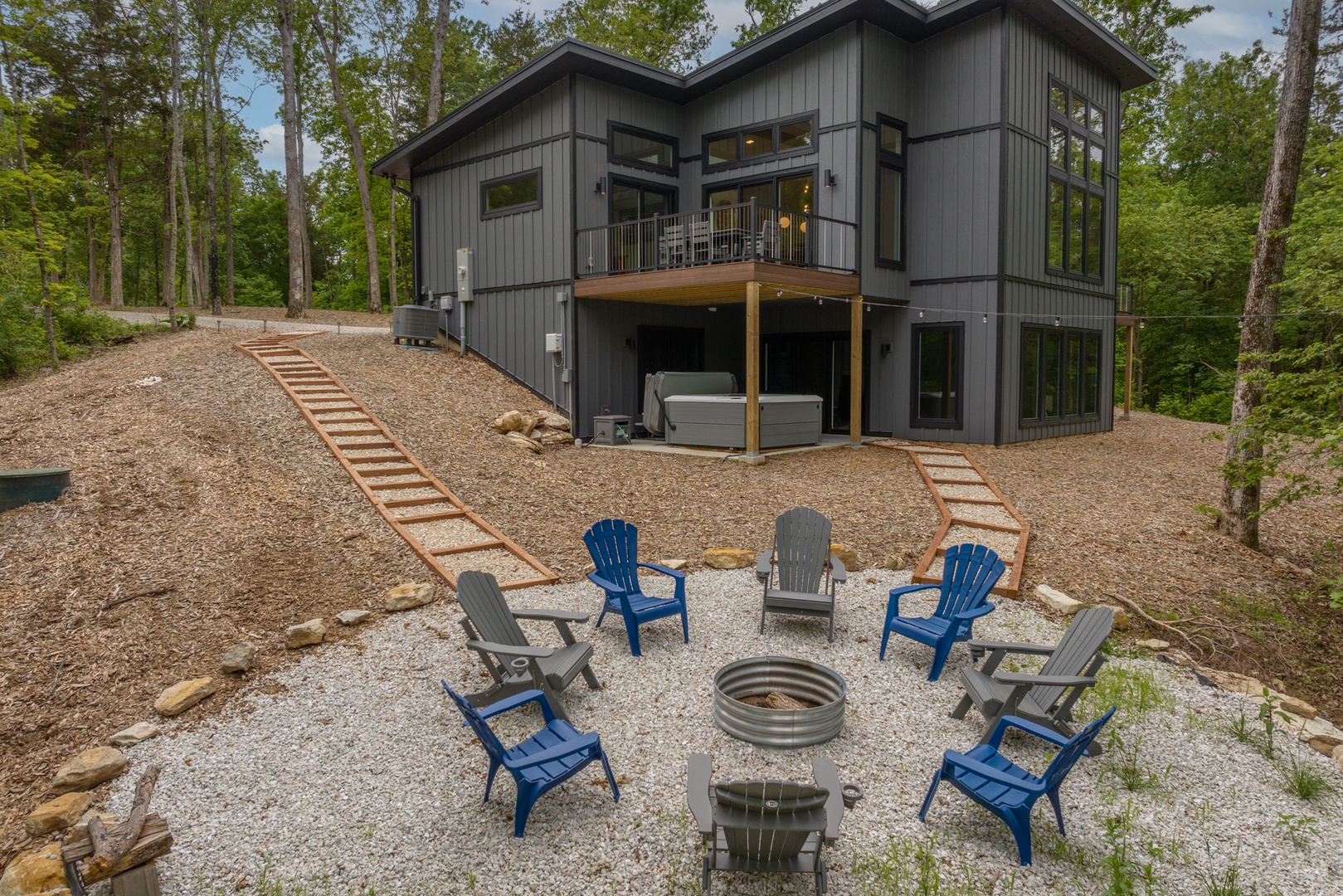 Enjoy lofted views of the Innsbrook valley below from the expansive deck or while relaxing in the hot tub