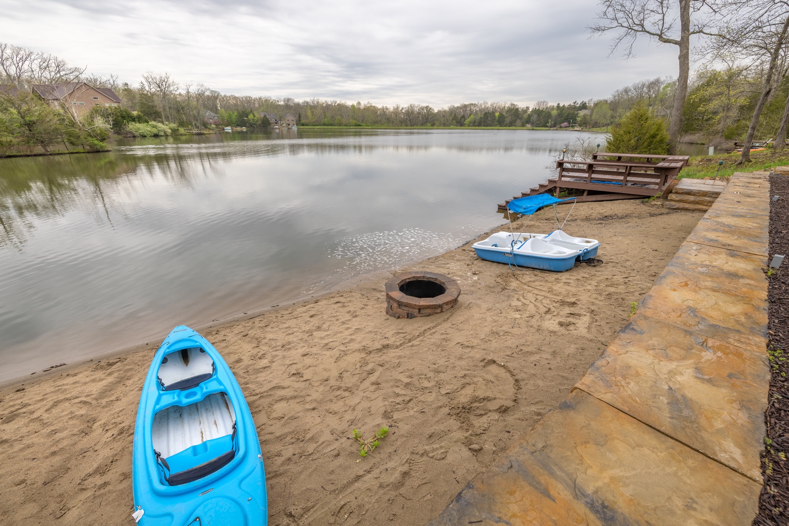 Live lake life to the fullest! Enjoy lounging on the private beach, roasting marshmallows lakeside, or exploring Lake Charrette on one of the many water toys