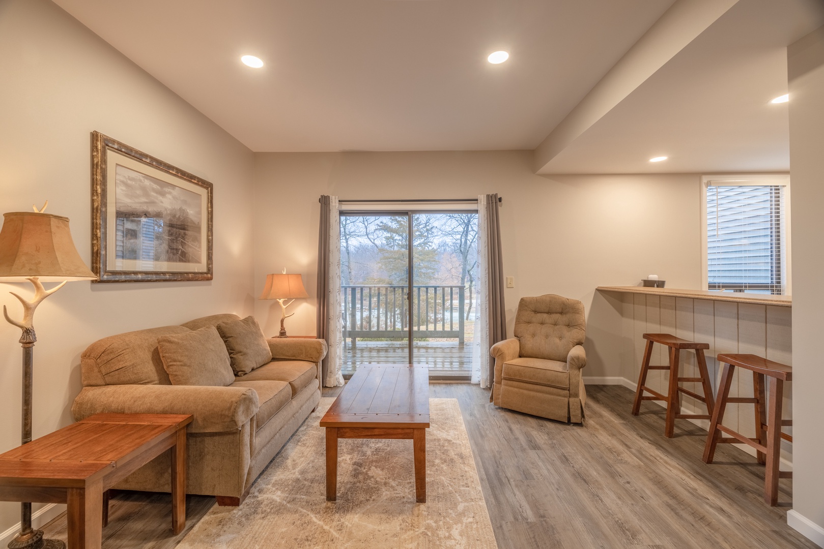 Open living area with wood-burning fireplace