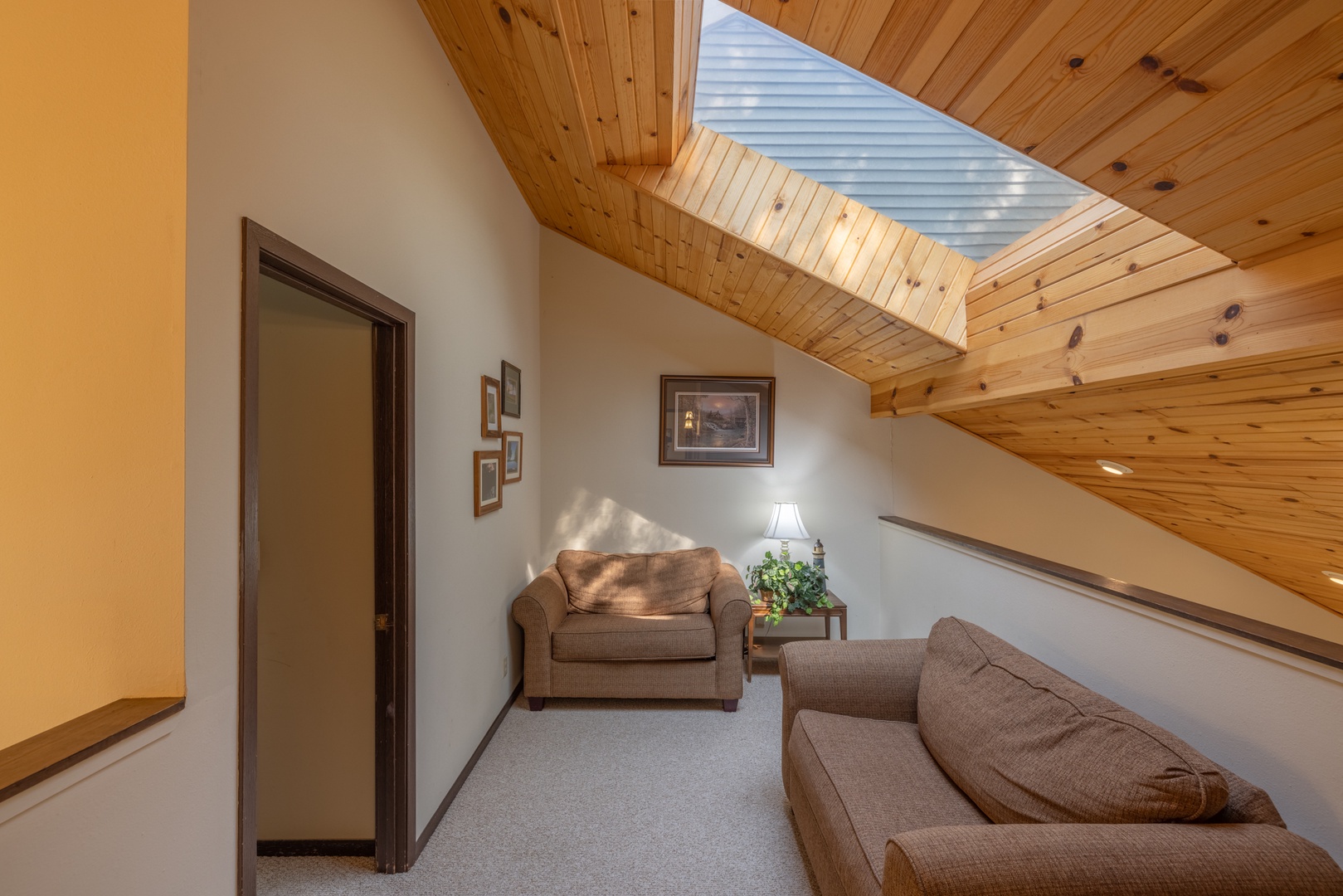 Loft space with skylight and 2 sleeper sofas