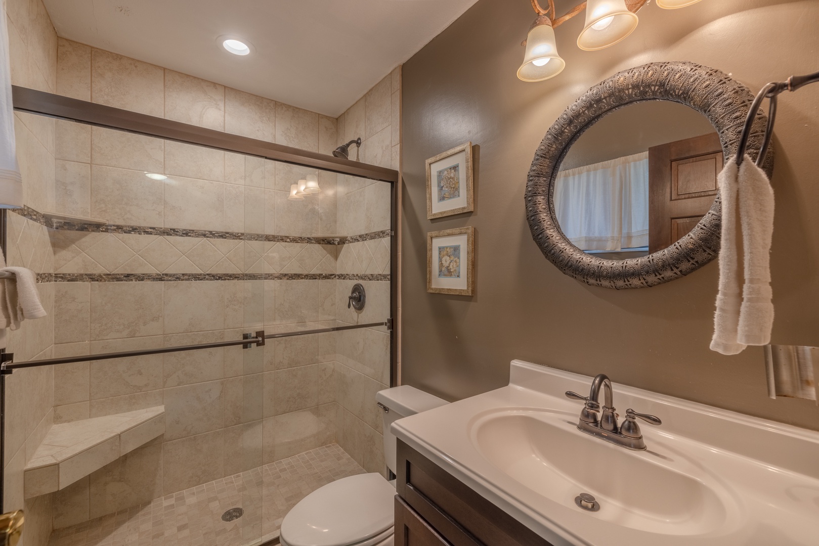 Recently remodeled full bathroom on the main level with spacious walk-in shower