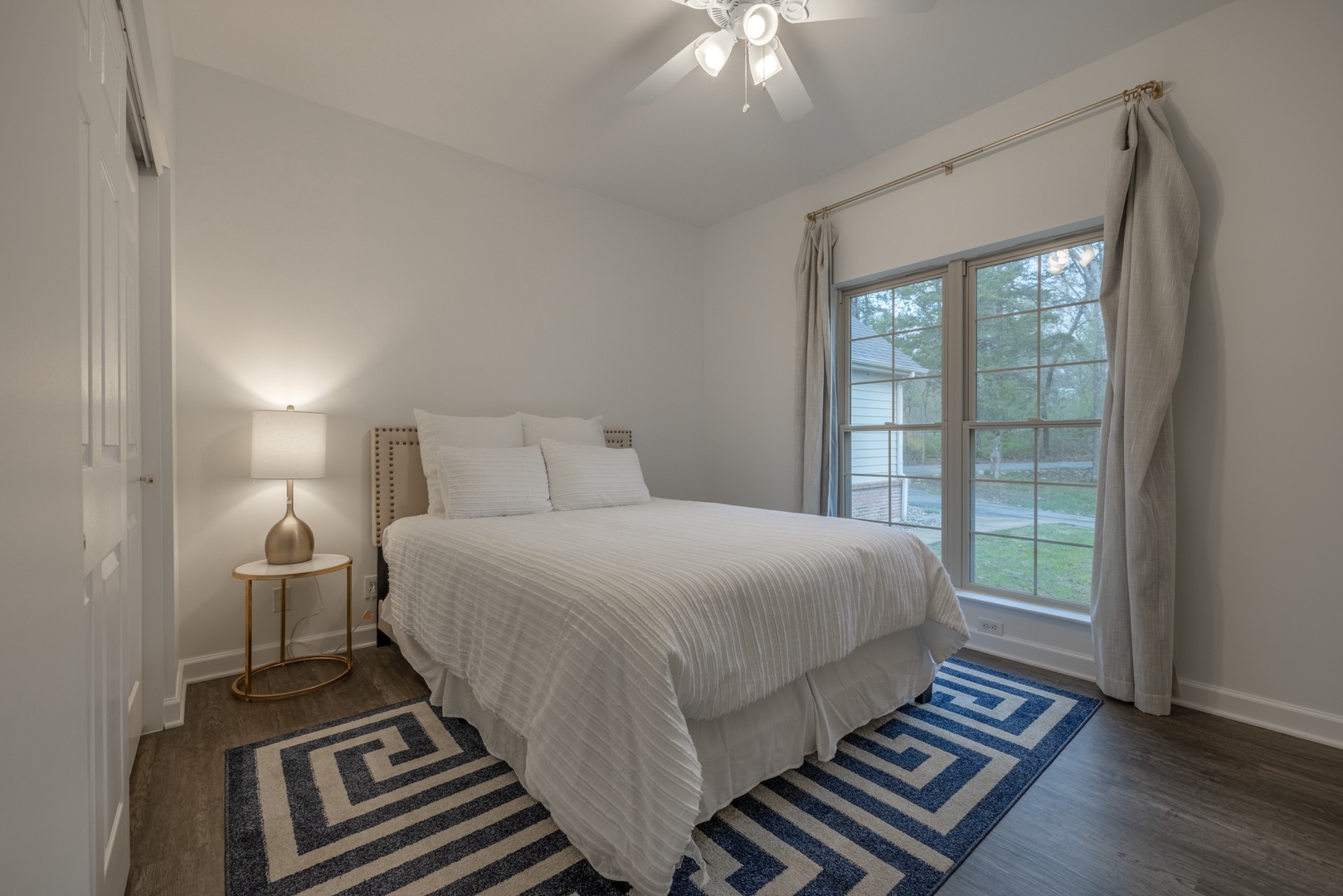 The second guest bedroom contains one full bed and luxury linens for ultimate comfort