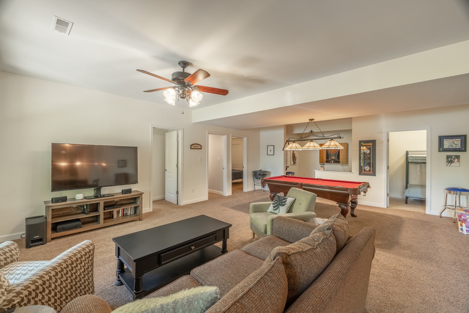 An entertainers dream! Play pool, watch TV, or hangout by the bar in the finished lower level