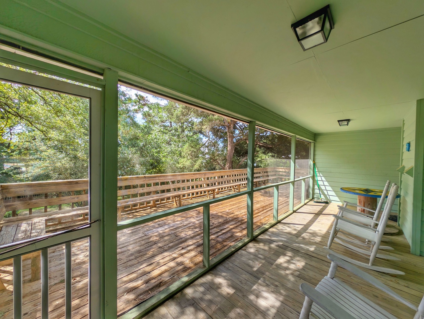 Sip your morning coffee from the screened porch, where gentle breezes and leafy views create your own peaceful retreat among the treetops.